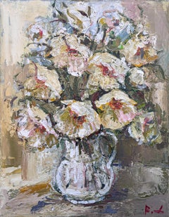 "Yellow flowers in a vase"