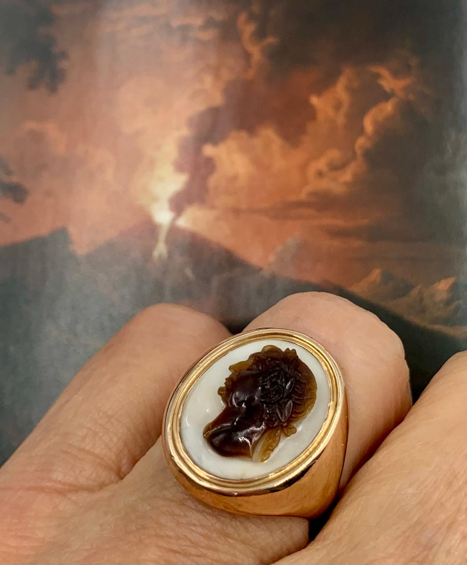 Superbly carved Georgian period sardonyx cameo signet ring depicting  Roman Emperor Augustus in profile
Late 18th/ Early 19th Century
Condition: Very Good, age appropriate wear
Size: 5.75 US
Width: 20mm
Height: 20mm
Tested for 18K gold