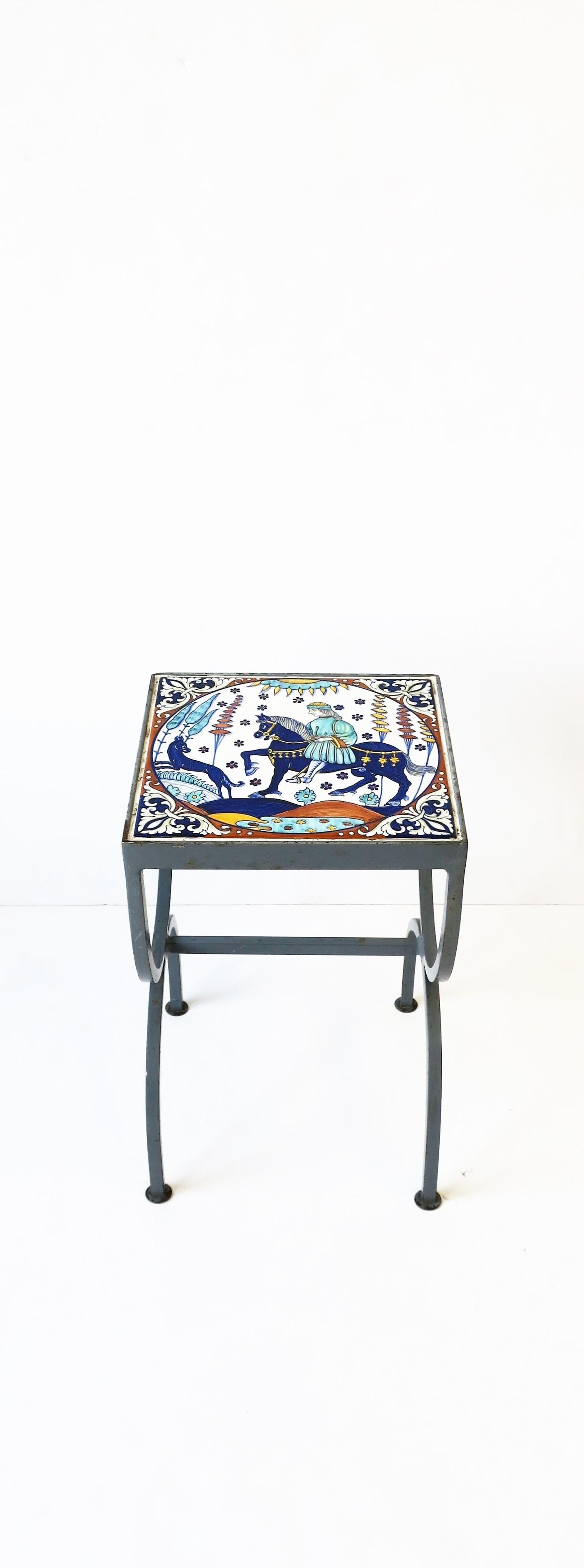 A small and substantial Roman equestrian ceramic tile top and grey metal side or drinks table, circa late 20th-early 21st century. Table's top is a single ceramic tile with a Roman design in the style of Hermes. Tables' base is metal with a grey
