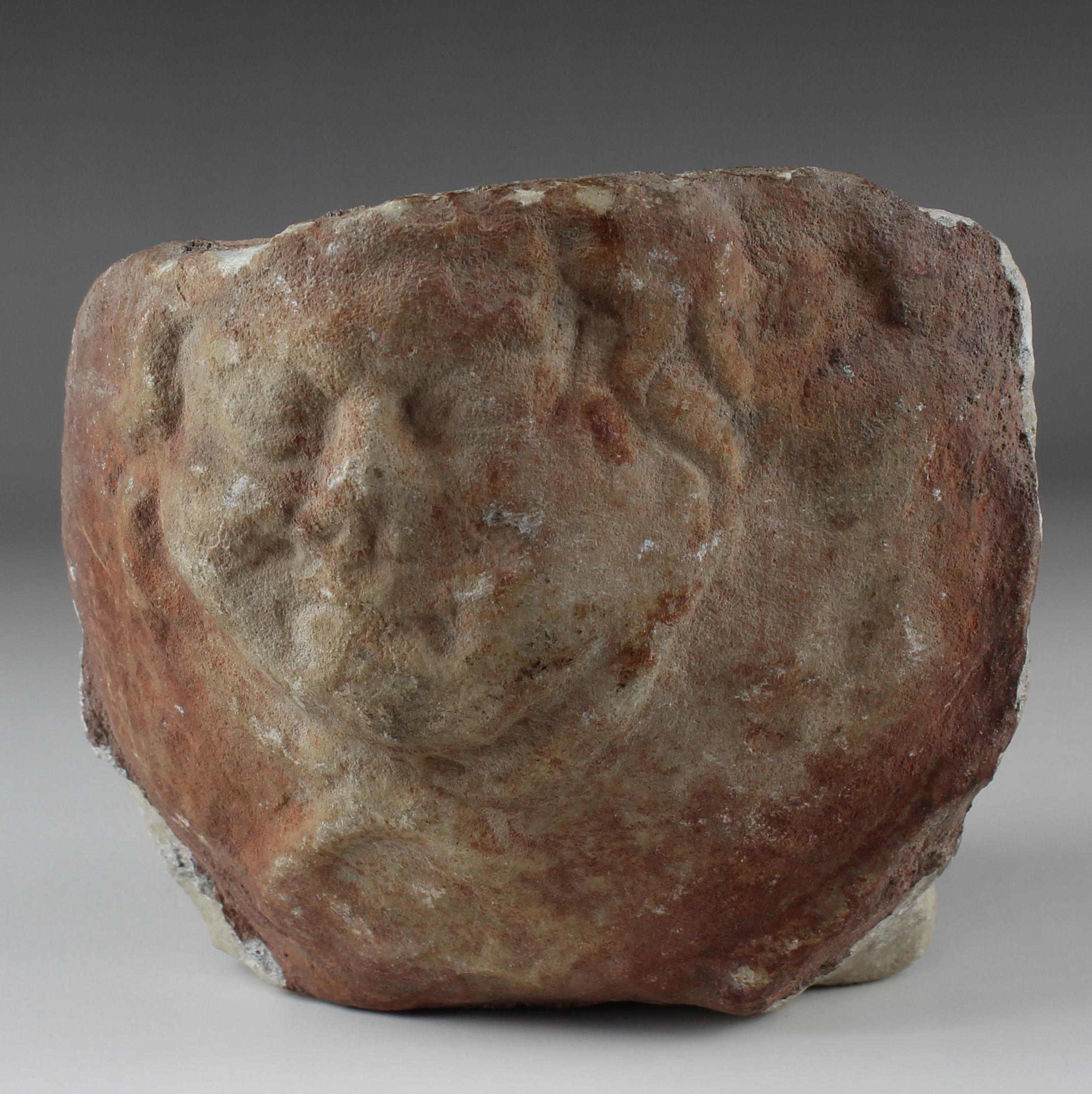 ITEM: Fragment of cuirass (Lorica musculata) with Gorgon
MATERIAL: Marble
CULTURE: Roman
PERIOD: 1st – 3rd Century A.D
DIMENSIONS: 110 mm x 130 mm x 83 mm
CONDITION: Good condition
PROVENANCE: Ex Collection of a Belgian gentlewoman, since