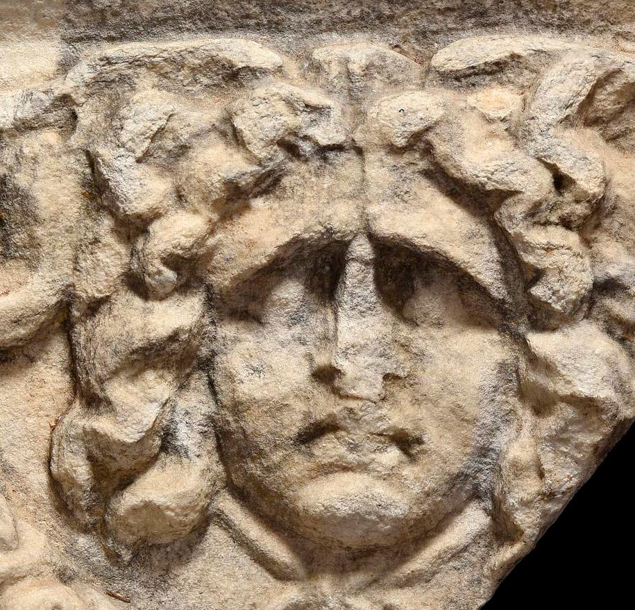Roman Fragment of Sarcophagus Depicting a Gorgon and Eros with Epitaph In Good Condition In EL CAMPELLO, ES