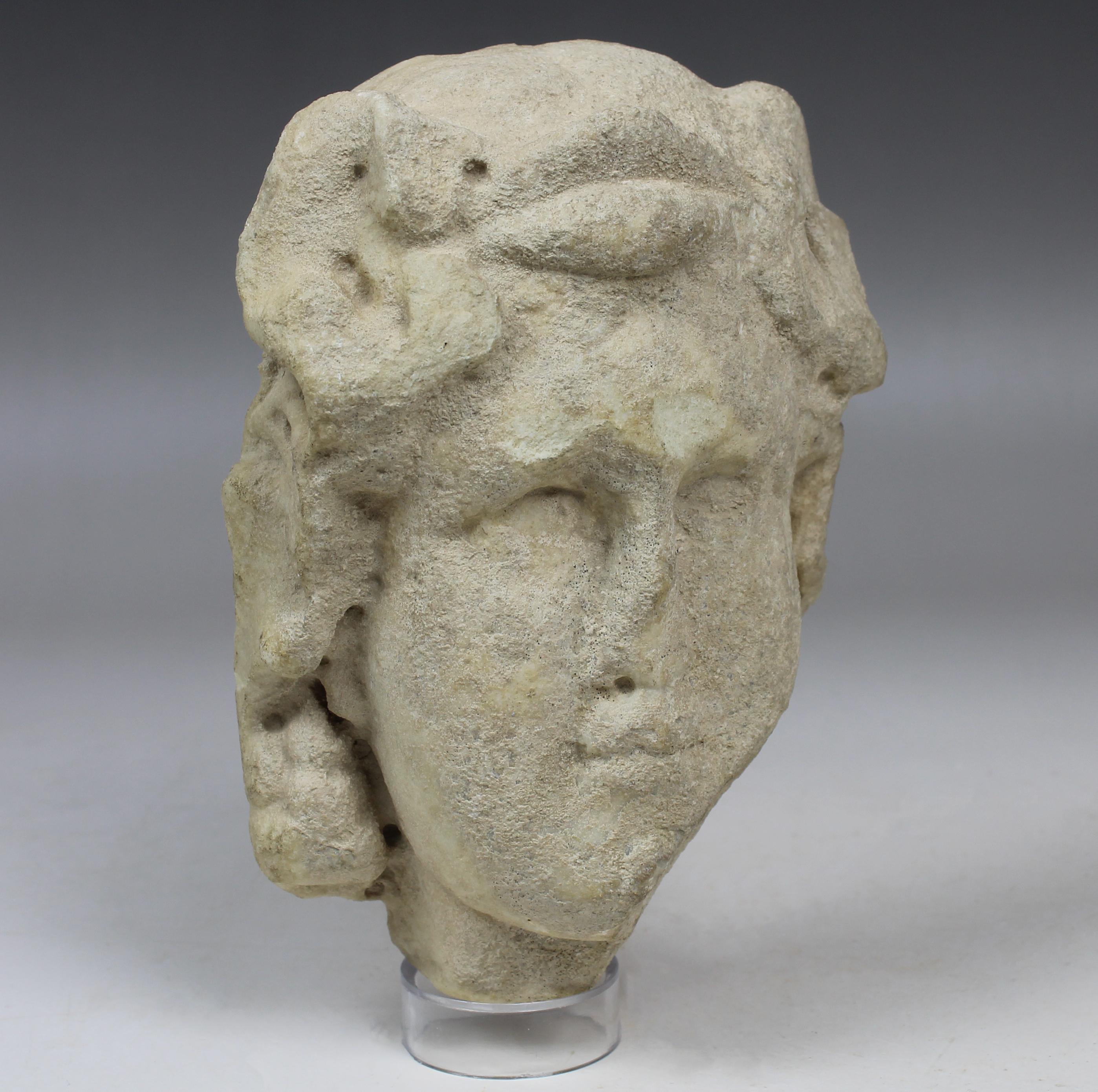 ITEM: Fragmentary herm of youthful Bacchus / Dionysos
MATERIAL: Marble
CULTURE: Roman
PERIOD: 2nd Century A.D
DIMENSIONS: 130 mm x 93 mm
CONDITION: Good condition
PROVENANCE: Ex Spanish private collection, acquired between 1980 – 2000

Comes with