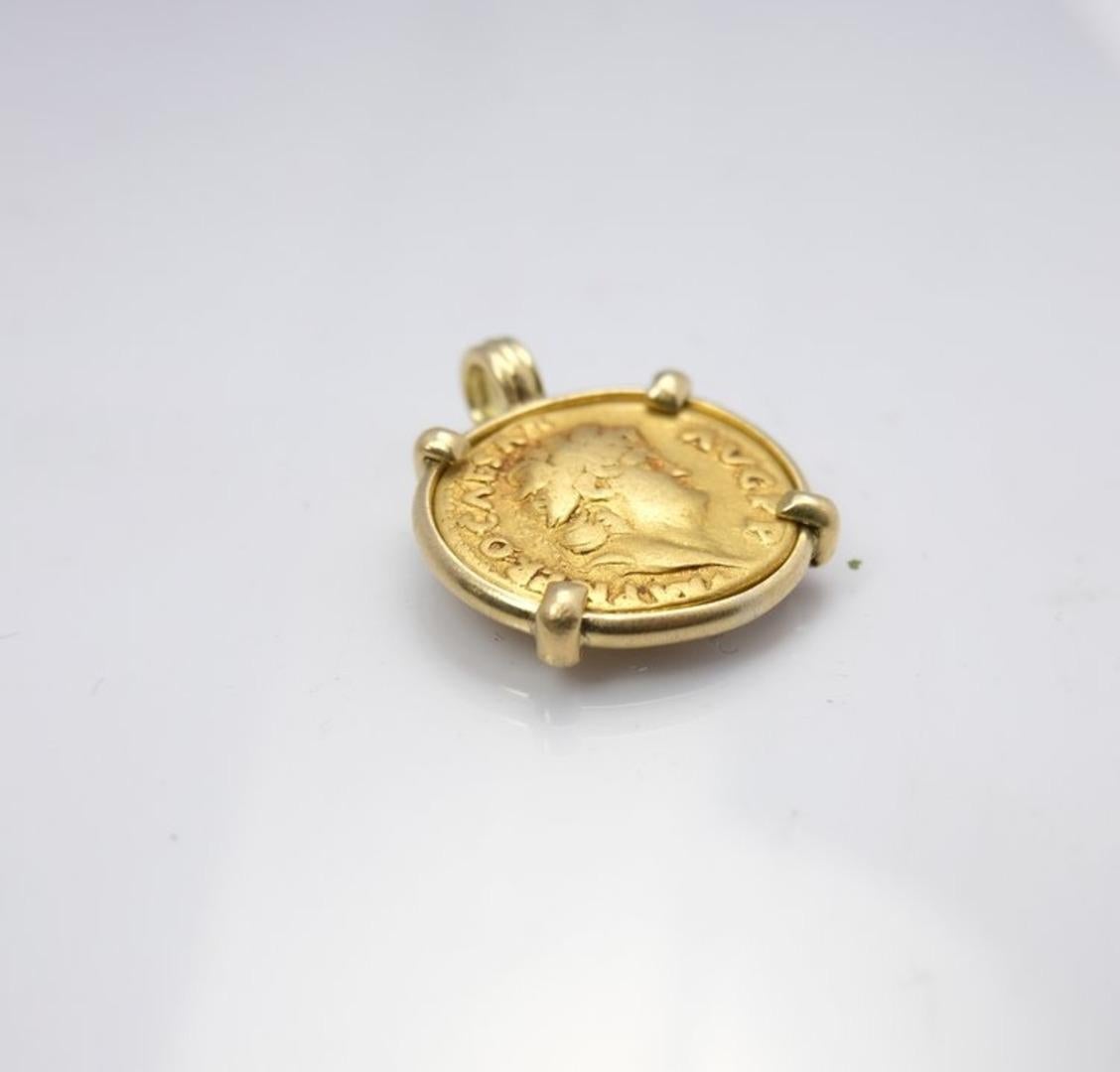 The first of its kind in my shop, a Roman gold Aureus. I cannot find any online shop that sells these set in gold. This stunning coin measures about 19 mm and weighs nearly 7 grams.

The mount was carefully handmade after which the coin was set in