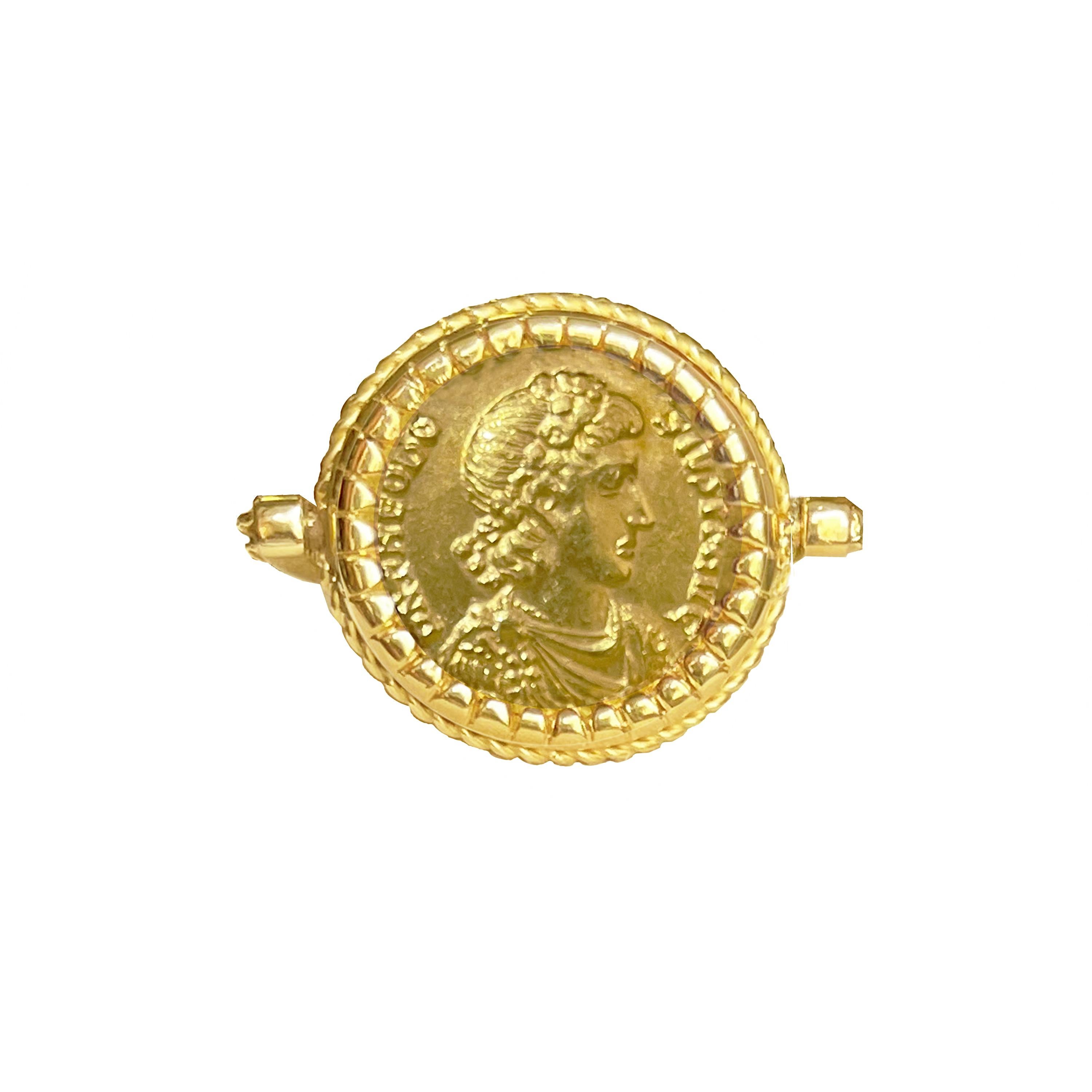 In this splendid gold ring, revolving, is set an authentic 24 Kt gold  Roman coin (solidus) dating back to the 4th century AD, which represents on one side the Emperor Theodosius I and on the other side the inscription 