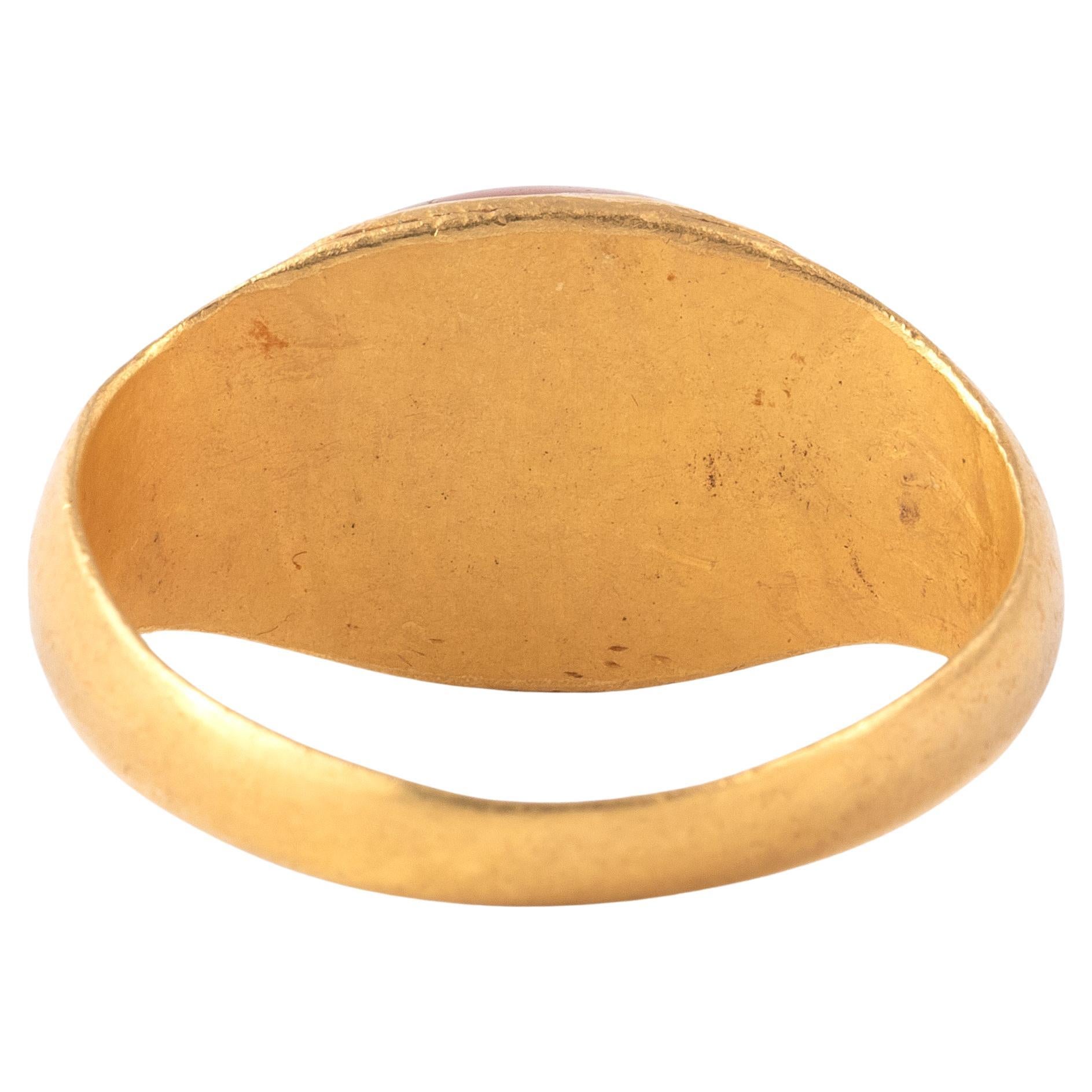 Uncut Roman Gold Ring With Carnelian Intaglio of a Gryllos Sileno And Eagle For Sale