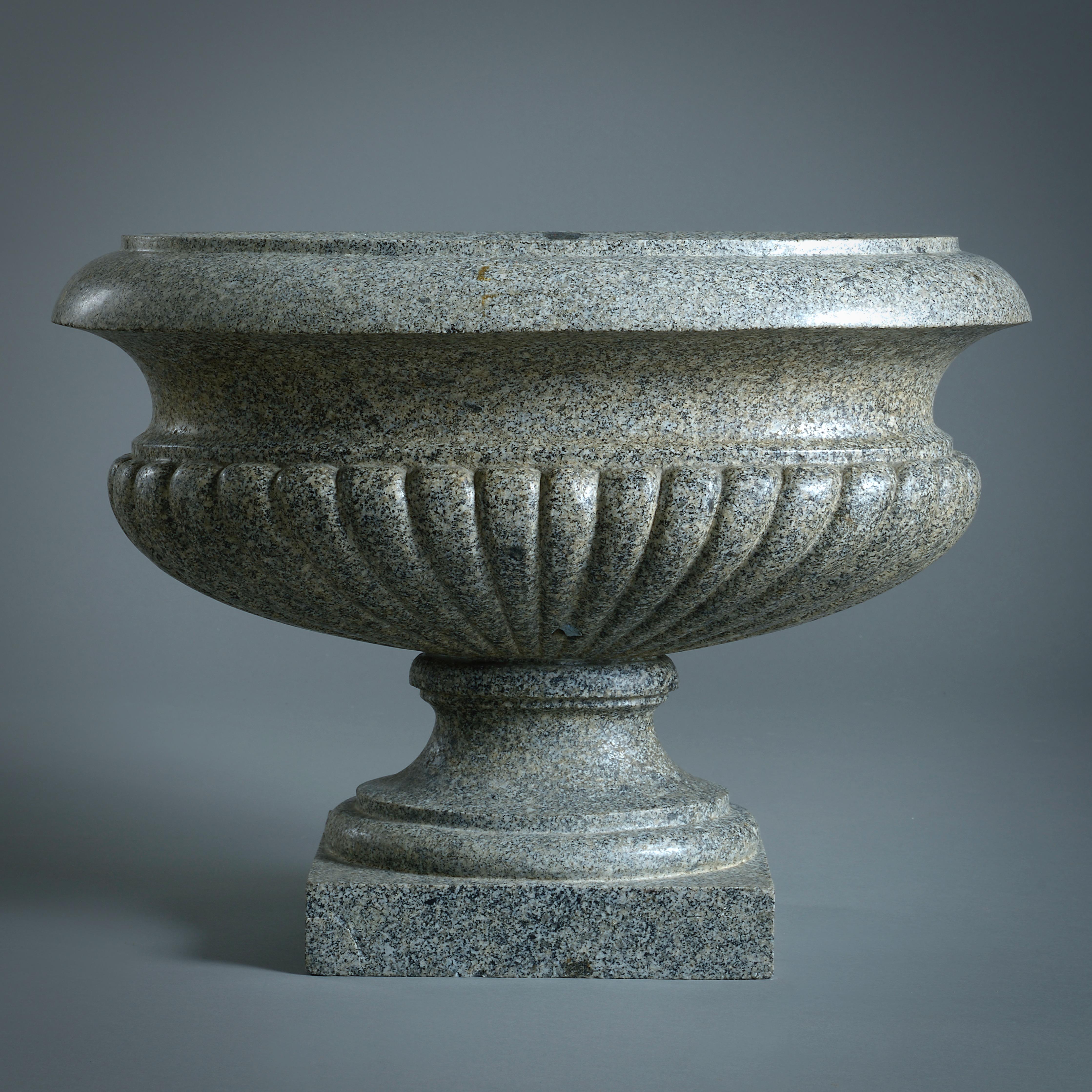 A Roman 'Granito del Foro' ribbed oval vase, circa 1700.