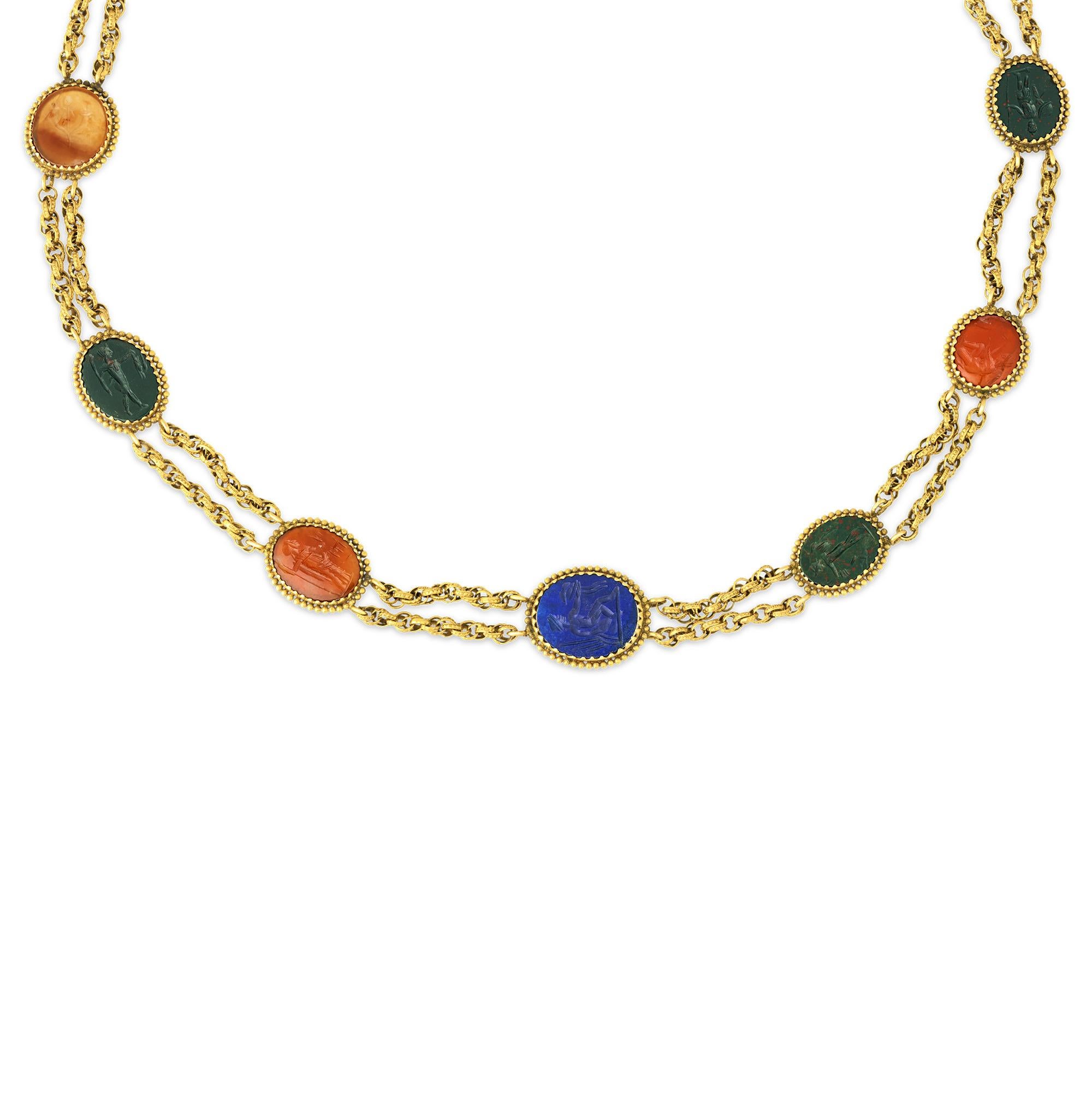 Eleven exceptionally rare carved gemstones are featured in this museum-quality Victorian necklace and the majority of the intaglio gems date to ancient Rome. Also known as gem carving, the art of intaglio dates to as early as the 14th century B.C.E.
