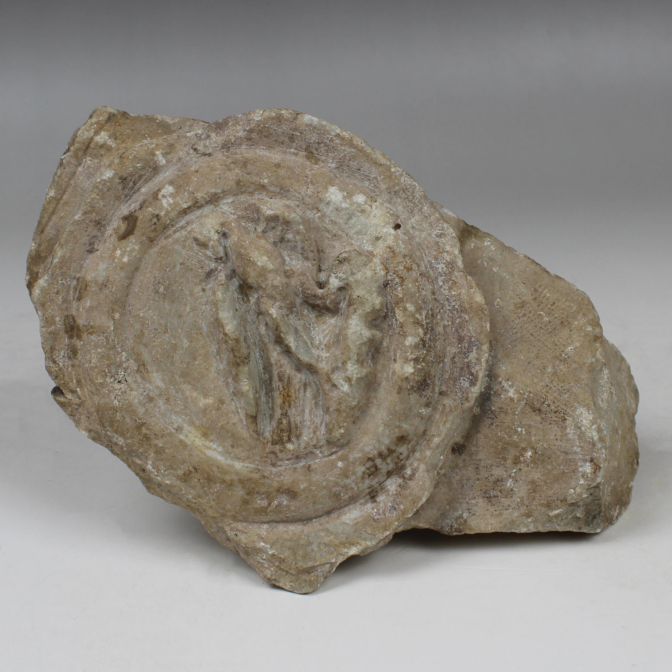 Roman lorica thoracata depicting a medallion with eagle, fragment 1
