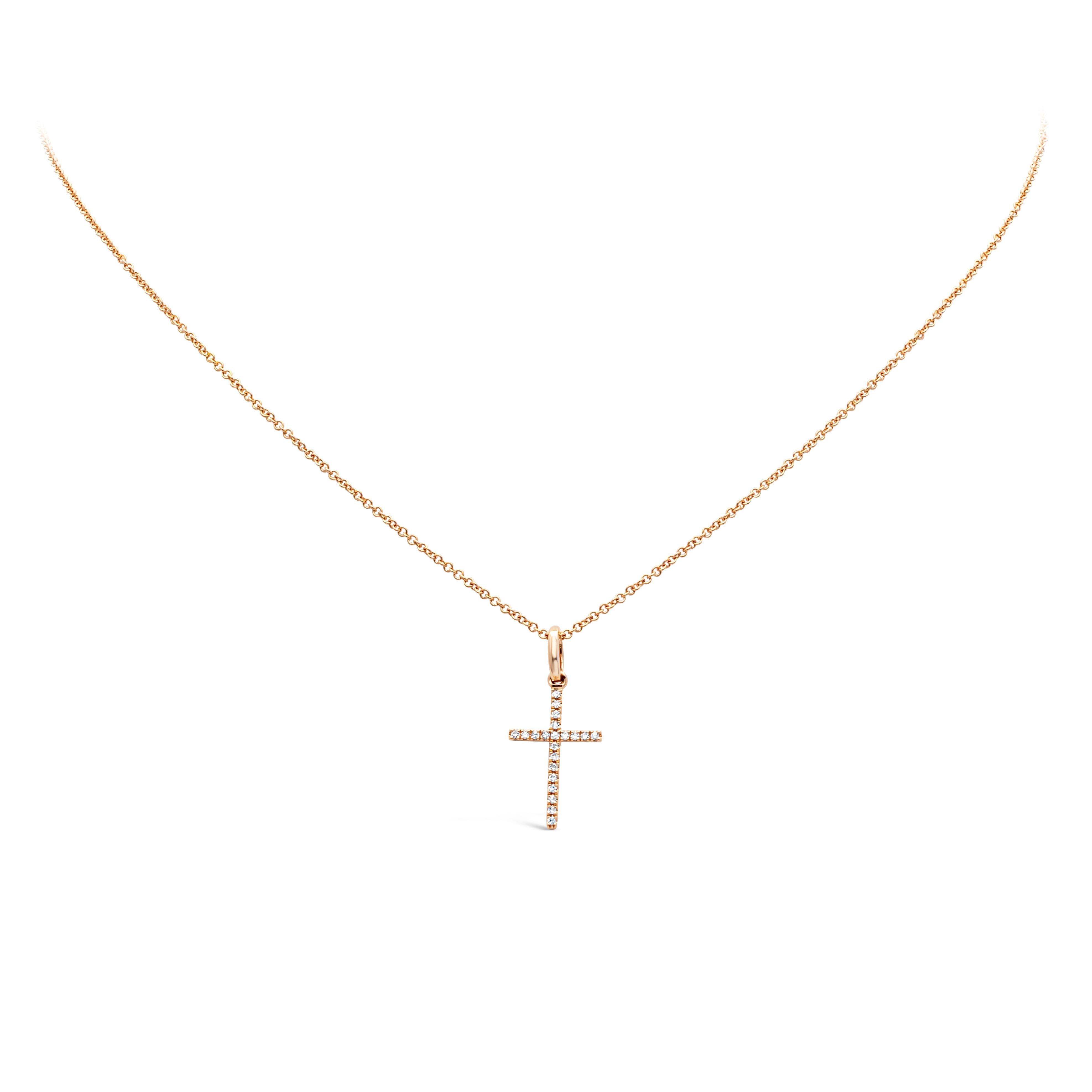 A small pendant necklace showcasing 0.06 carats total brilliant round diamonds, set in a religious cross design. Suspended in a 16 inch 18K Rose Gold chain. Perfect for your everyday use.

Roman Malakov is a custom house, specializing in creating