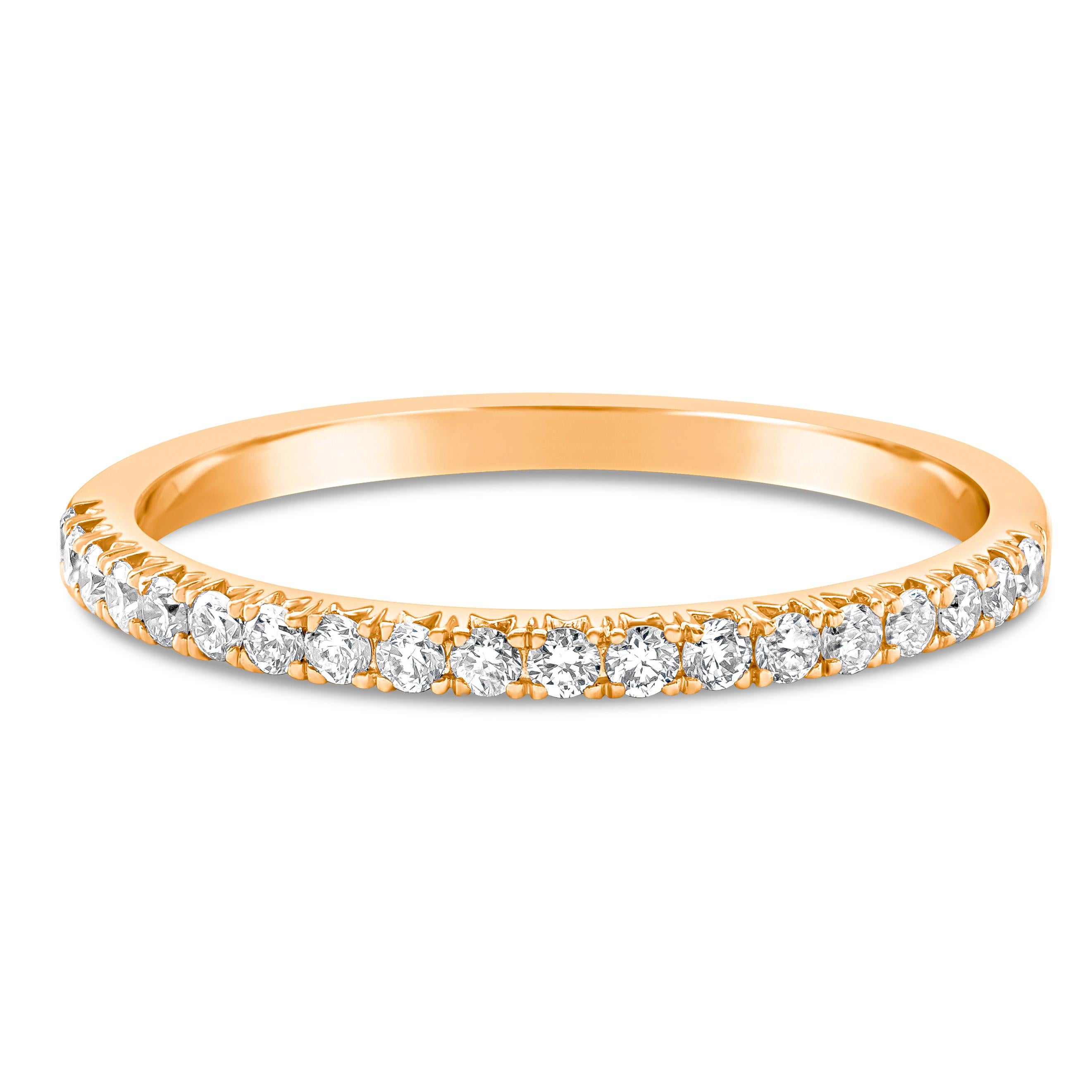 A simple and classic wedding band style showcasing round brilliant diamonds set in a french pave setting, Diamonds weigh 0.25 carats total. Made with 18K Rose Gold
Size 6.5 US.

Style available in different price ranges. Prices are based on your