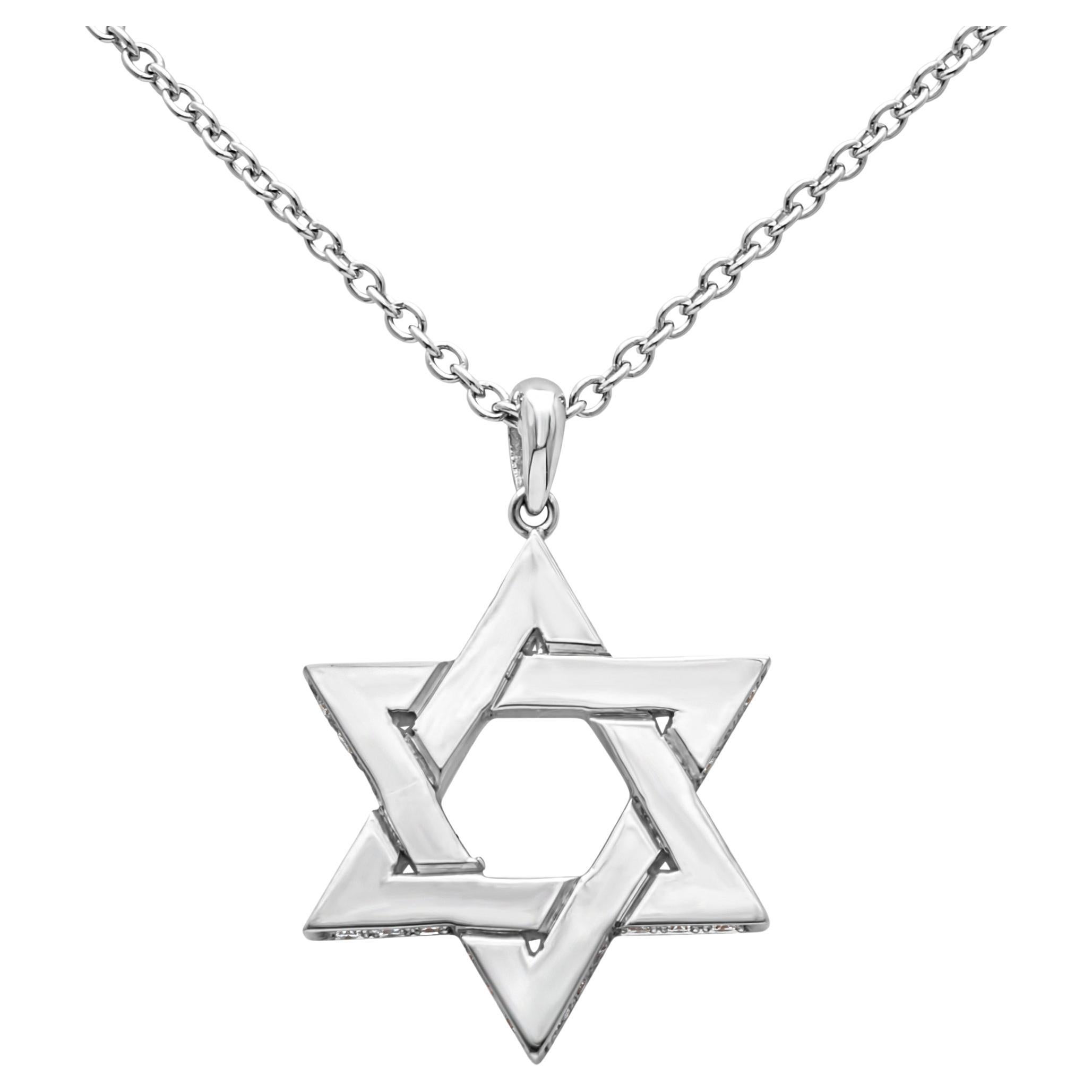 A simple Star of David pendant made in solid Platinum accented with round diamonds on each side of the star weighing 0.25 carats total, F color and VS in clarity.  Suspended on an 18 inch chain, adjustable upon request. 

Roman Malakov is a custom