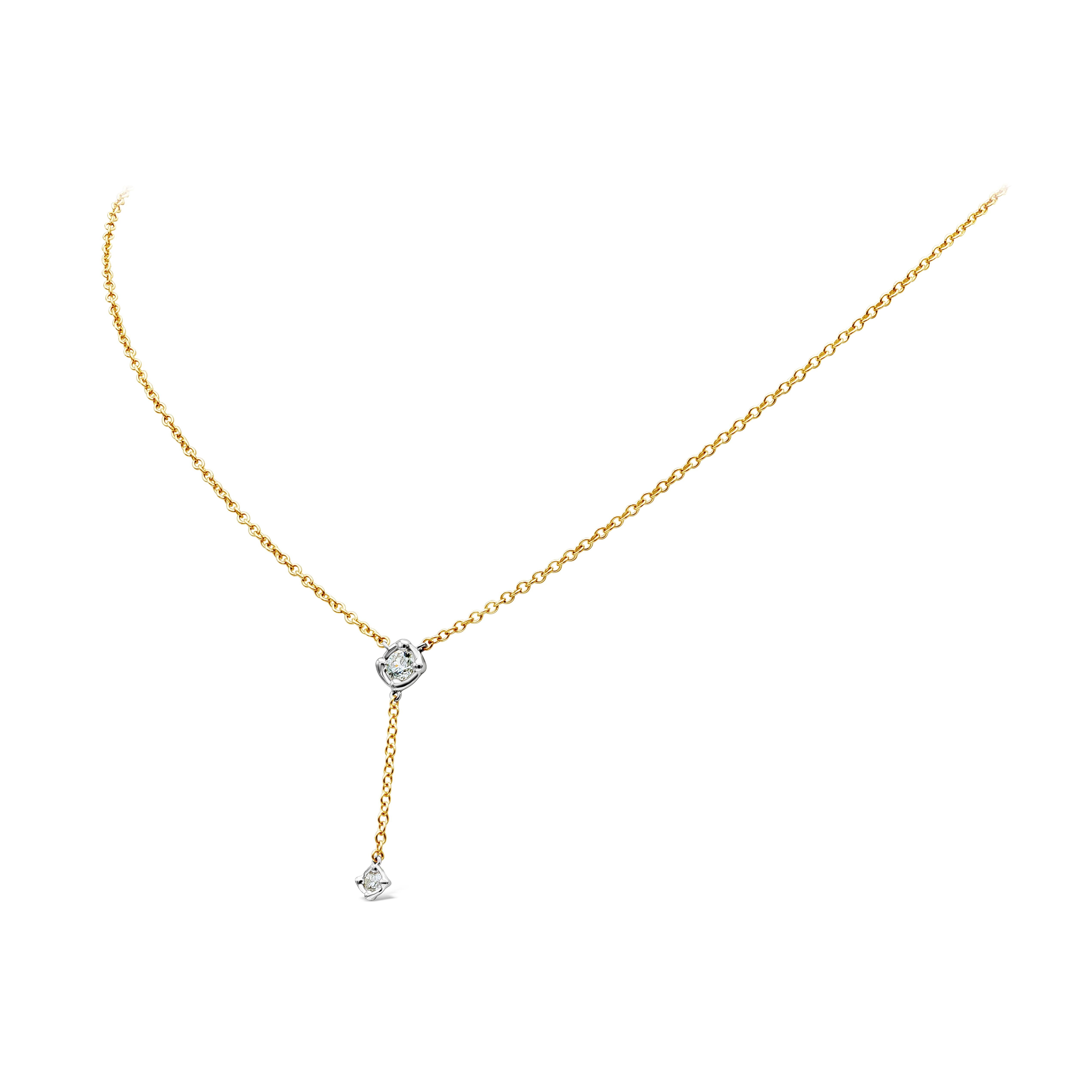 A simple pendant necklace showcasing 2 solitaire round diamond weighing 0.29 carat total. Small round diamond suspended on a slightly bigger diamond both set in white gold bezel. Made with 18K Yellow Gold Chain. 16 inches in Length. 

Style