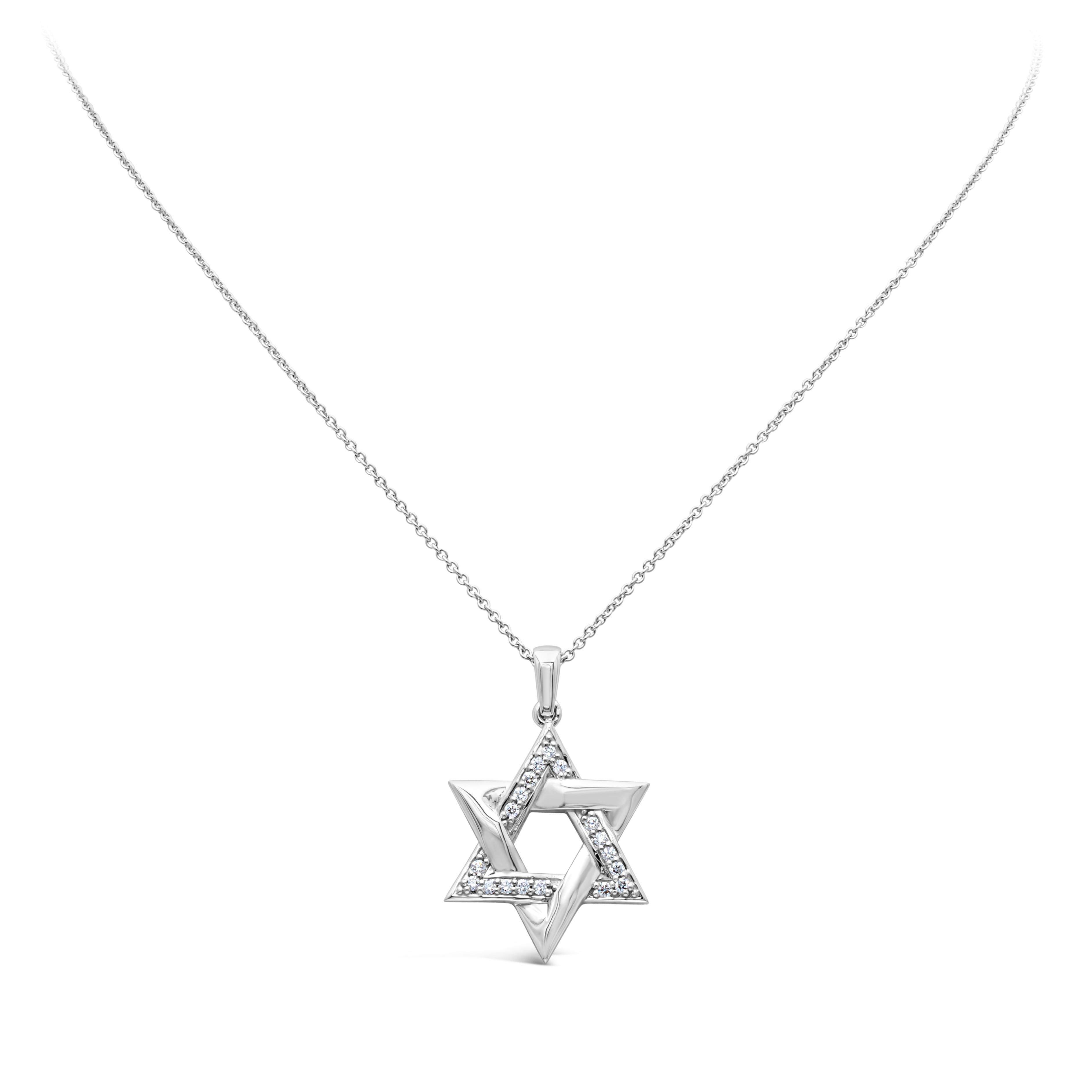 A simple Star of David pendant made in 18K White Gold accented with round diamonds weighing 0.30 carats total, F color and VS in clarity. Suspended on an 18 inch chain. Perfect for your everyday use. 

Roman Malakov is a custom house, specializing