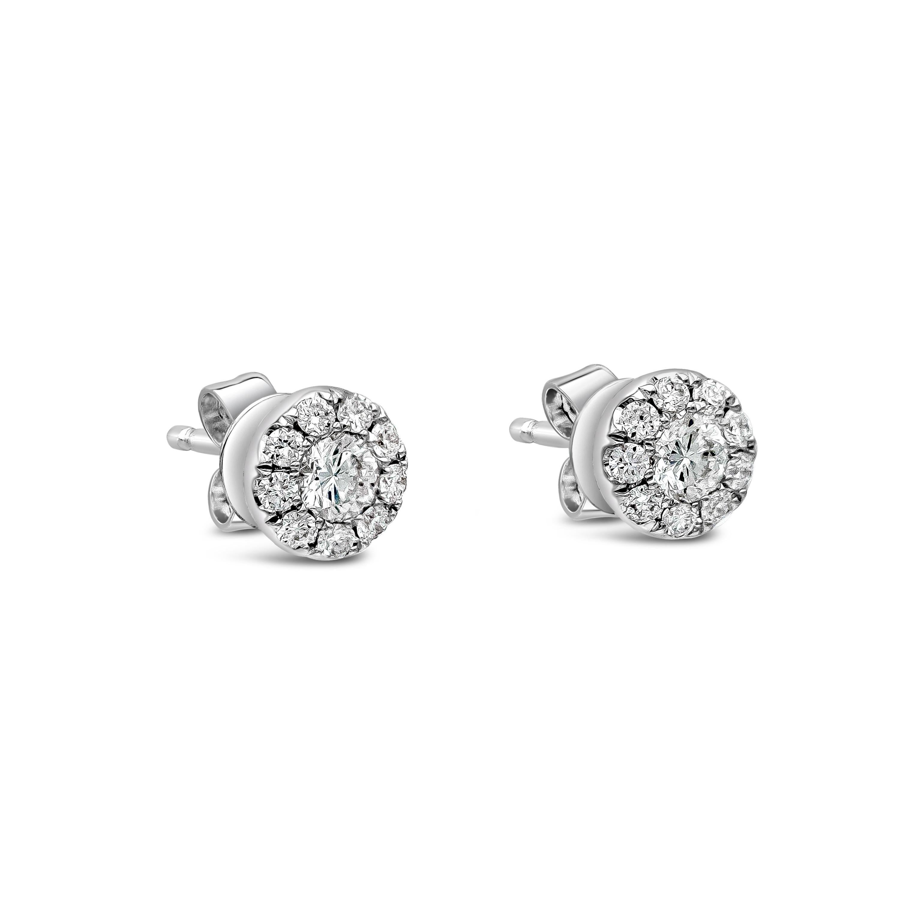 A classic pair of stud earrings showcasing a cluster of round brilliant diamonds set in an 18k white gold mounting. Diamonds weigh 0.33 carats total and are approximately F color, SI in clarity.

Style available in different price ranges. Prices are