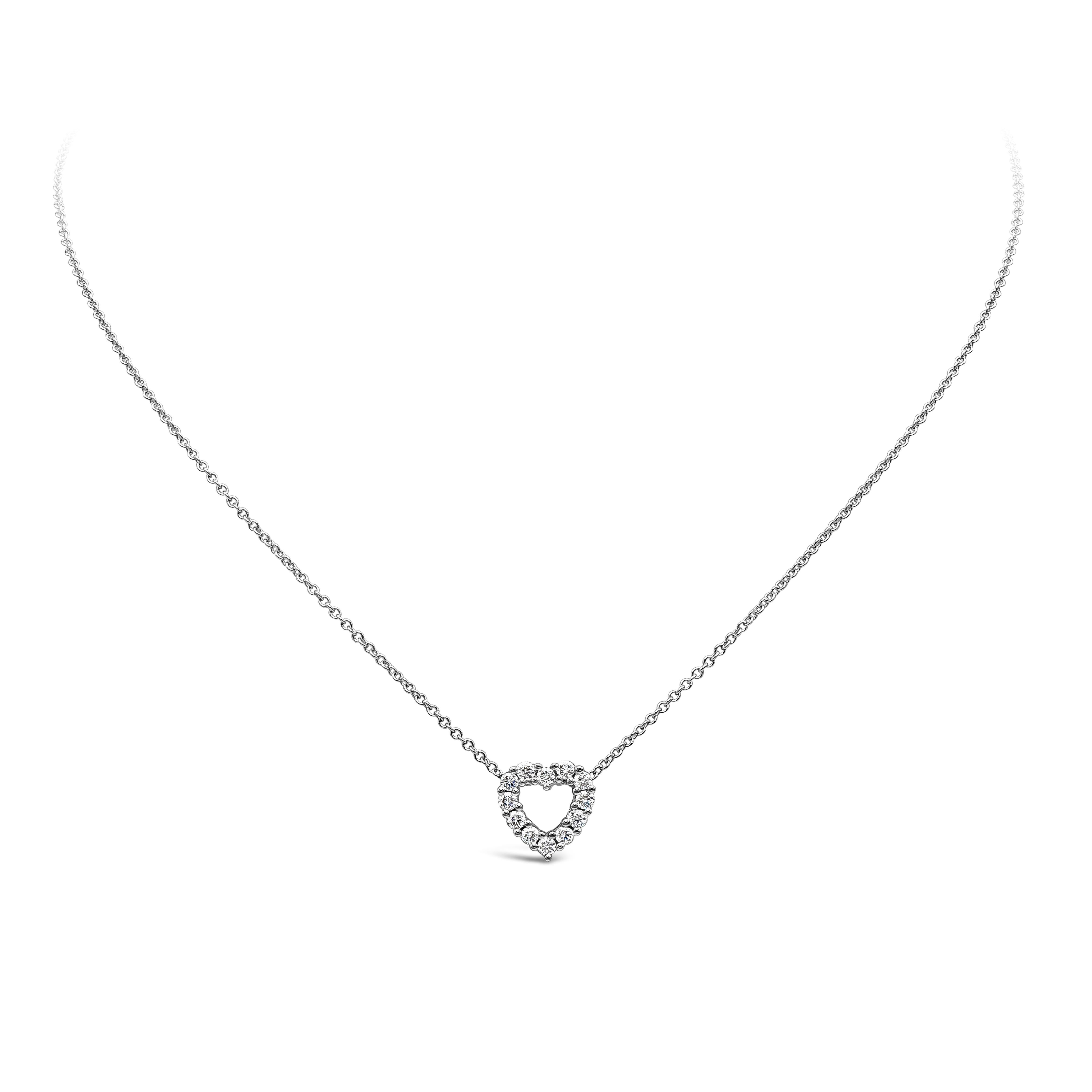 A simple pendant necklace showcasing a row of round brilliant diamonds weighing 0.35 carats total, set in an open-work heart shape mounting made in 18k white gold. Suspended on an 16 inch adjustable white gold chain.

Roman Malakov is a custom