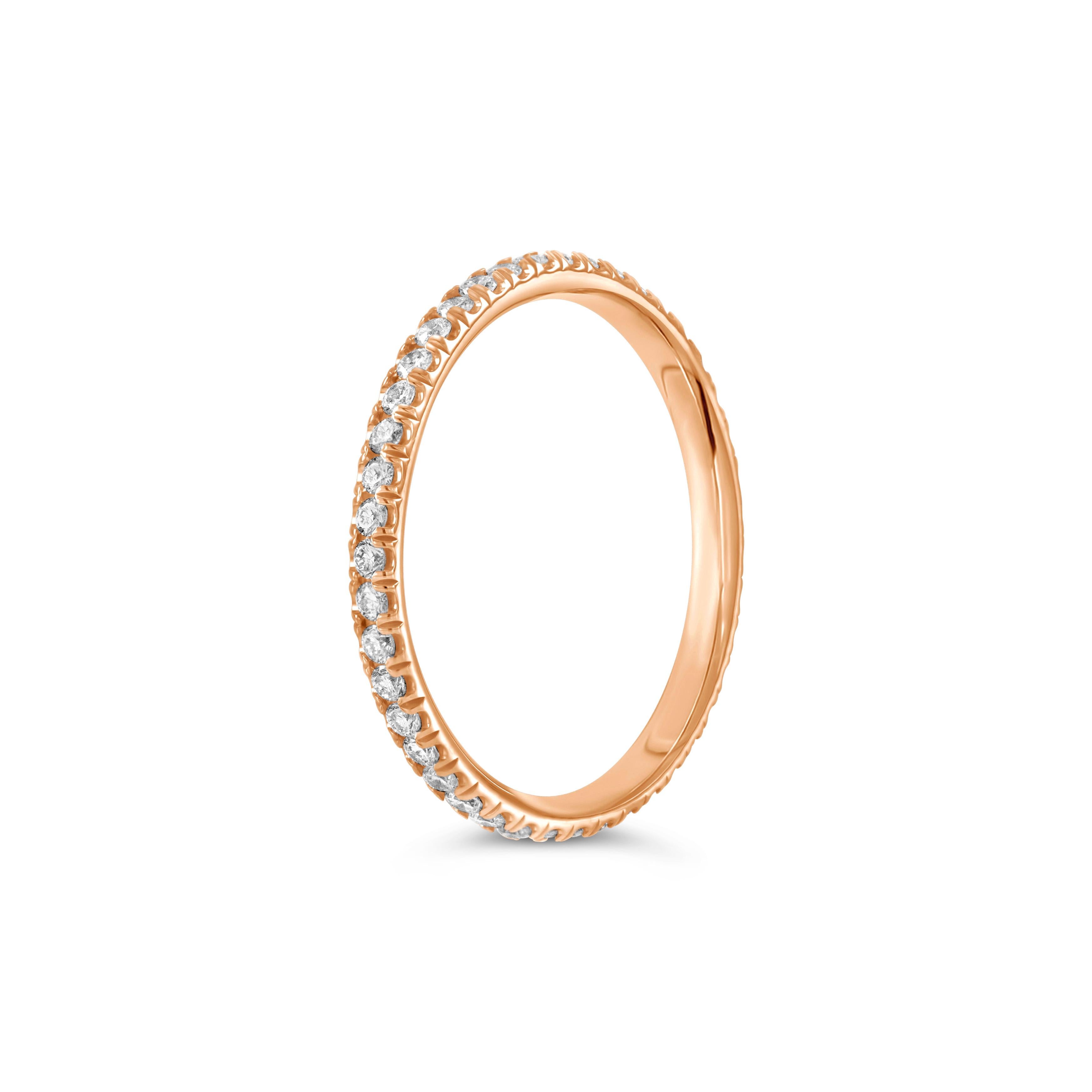 A simple eternity wedding band showcasing 44 round brilliant diamonds weighing 0.39 carats total. Made with 18K Rose Gold. Size 6 US.

Roman Malakov is a custom house, specializing in creating anything you can imagine. If you would like to receive a
