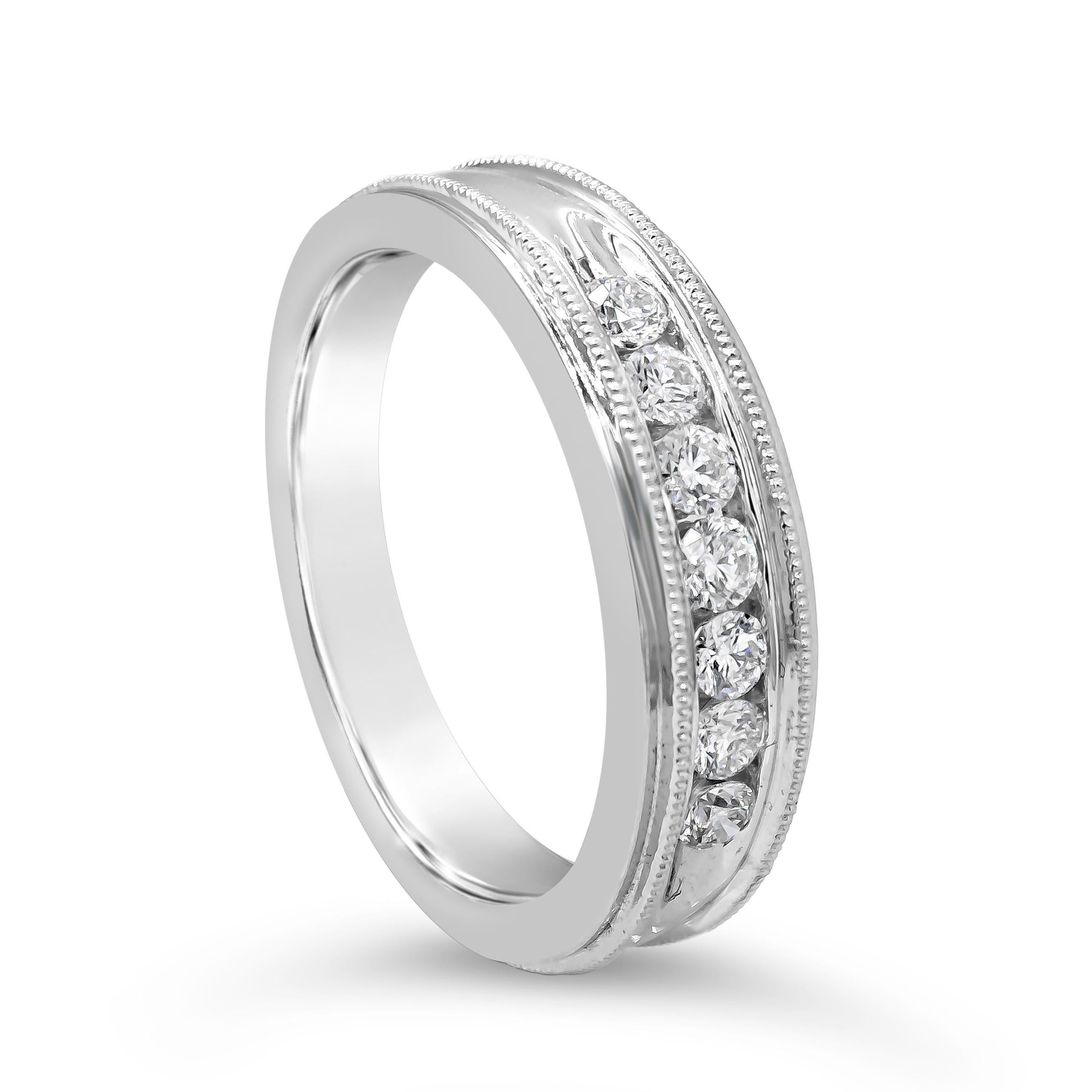This classic men's wedding band style showcases seven brilliant round diamonds weighing 0.49 carats total, mounted in a channel setting. Finished with millgrain edges. Made with 18K White Gold. Size 10.5 US.

Style available in different price