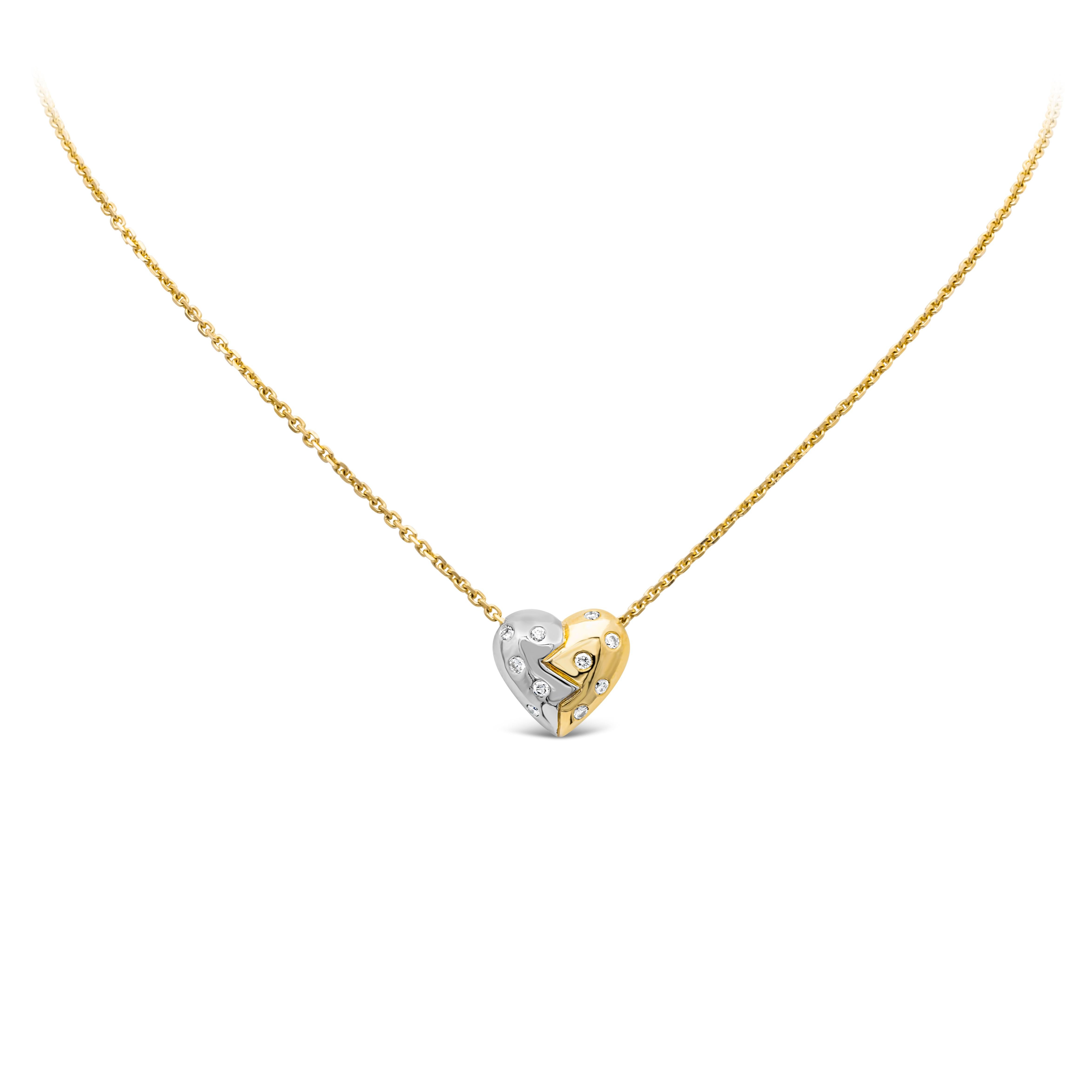 Simple but elegant two tone heart shape pendant necklace accented with 10 brilliant round diamond weighing 0.50 carats total. Finely made in 18K Yellow and White Gold. 17.6 inches in Length.

Roman Malakov is a custom house, specializing in creating