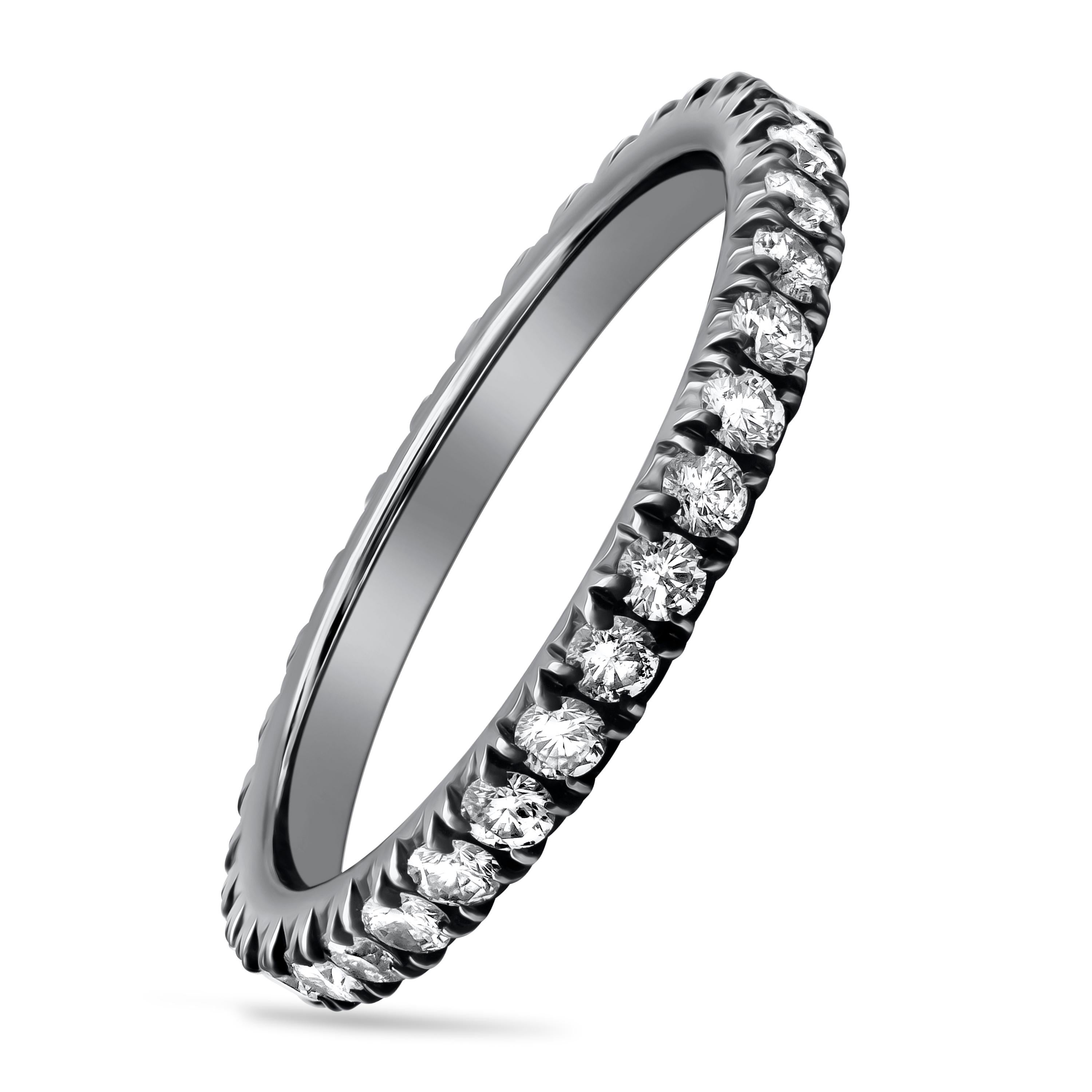 A classic eternity wedding band ring showcasing brilliant round diamonds weighing 0.70 carats total, G Color and SI3 in Clarity. Set in a french-pave setting, Made with 18K Black Rhodium Plated, Size 6.5 US resizable upon request.

Style available