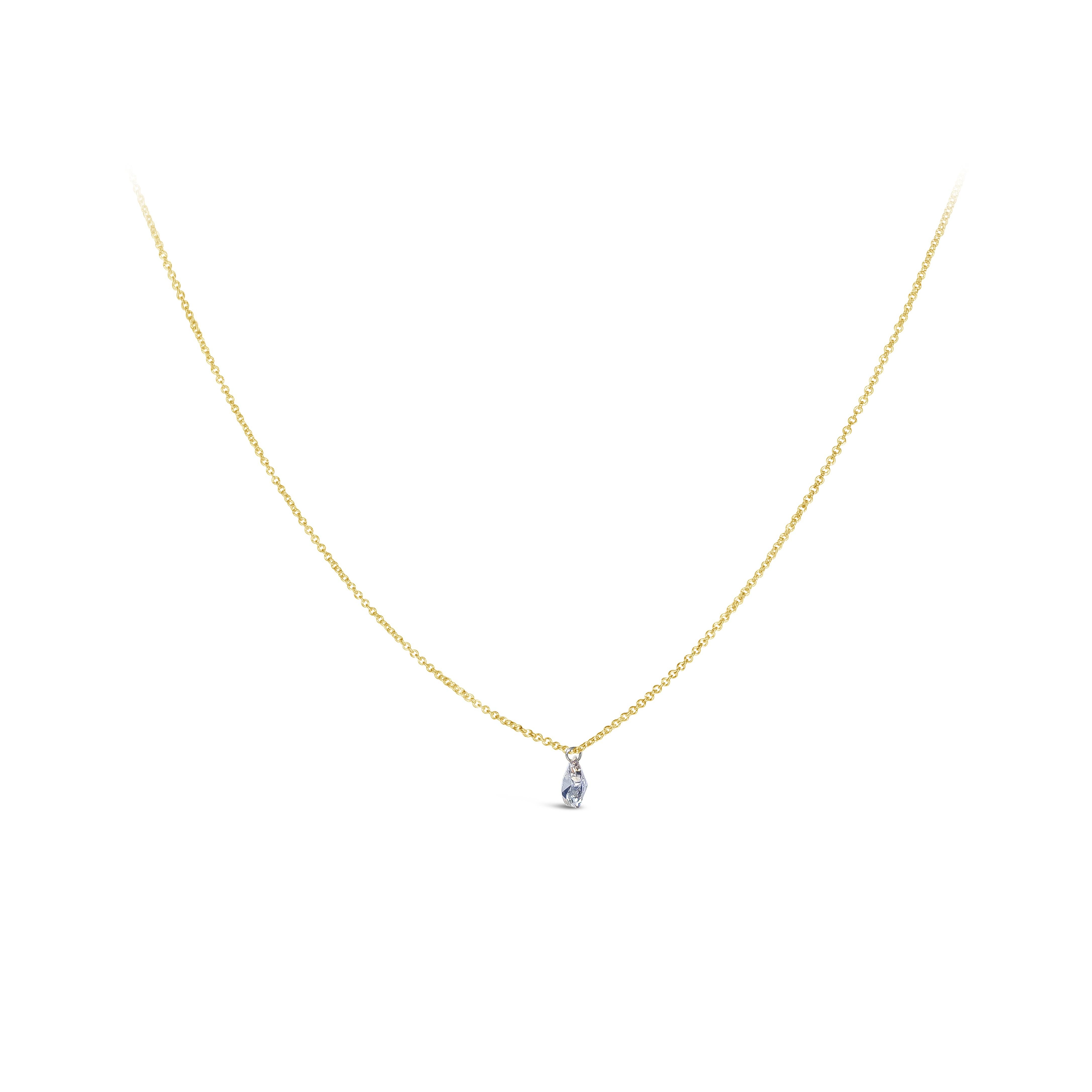 A simple and unique solitaire pendant necklace, showcasing a 0.54 carat seven-sided pear shape diamond with K color and SI clarity. Attached and drilled with an adjustable 18 inches 18K yellow gold chain.

Roman Malakov is a custom house,