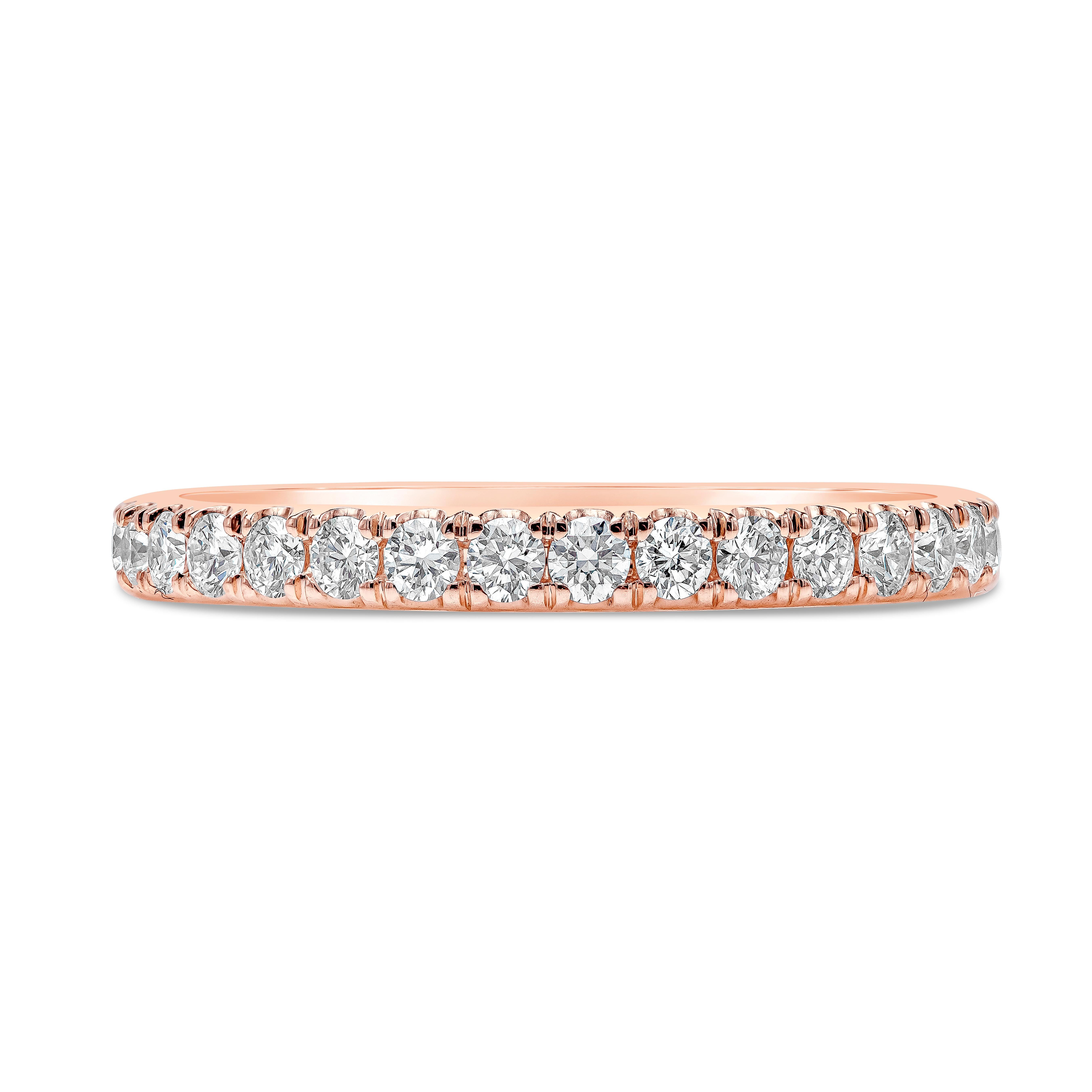 A timeless eternity wedding band style, showcasing a row of round brilliant cut diamonds weighing 0.55 carats total, set in a scalloped-pave setting of 18K rose gold. Size 6 US, resizable upon request.

Roman Malakov is a custom house, specializing