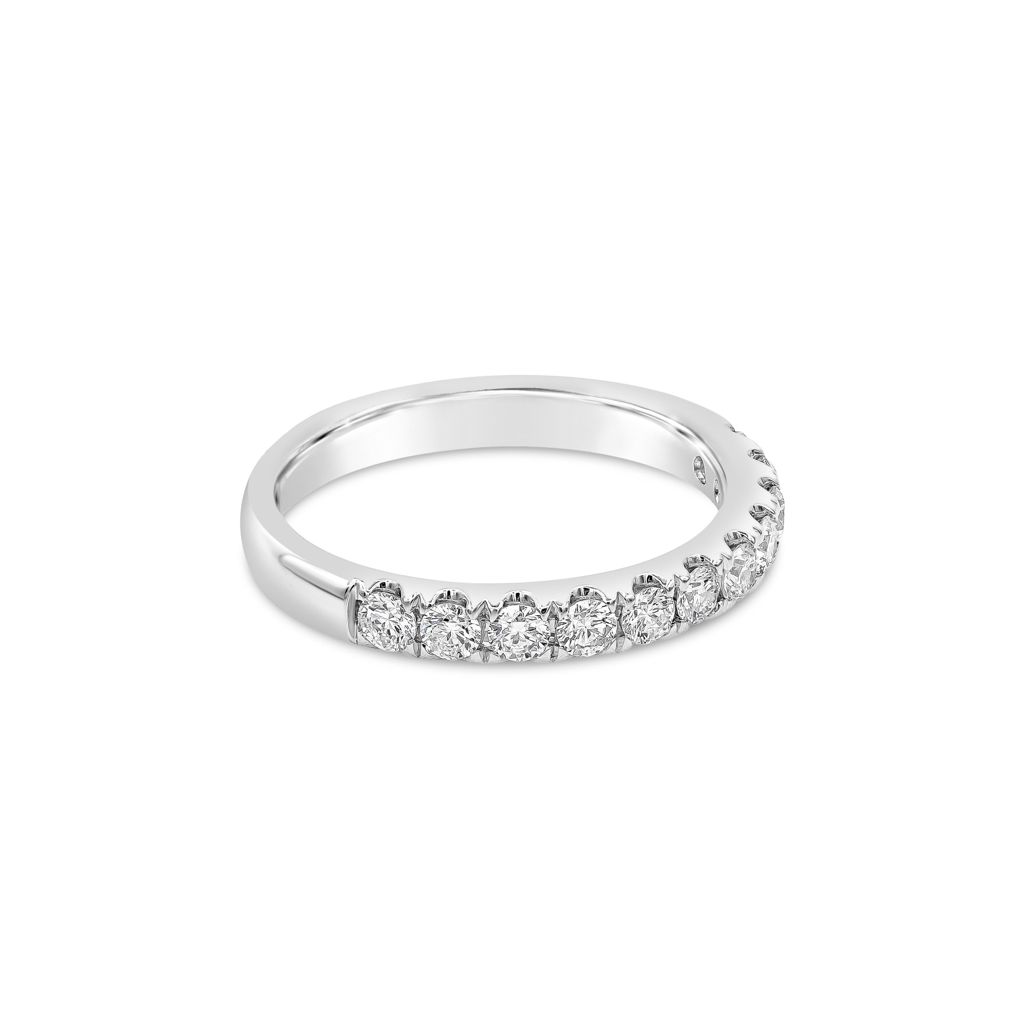 A classic eternity band style showcasing a row of round brilliant diamond weighing 0.56 carats, Mounted half-way micro-pave setting, Made with 14K White Gold, Size 6.5 US

Roman Malakov is a custom house, specializing in creating anything you can