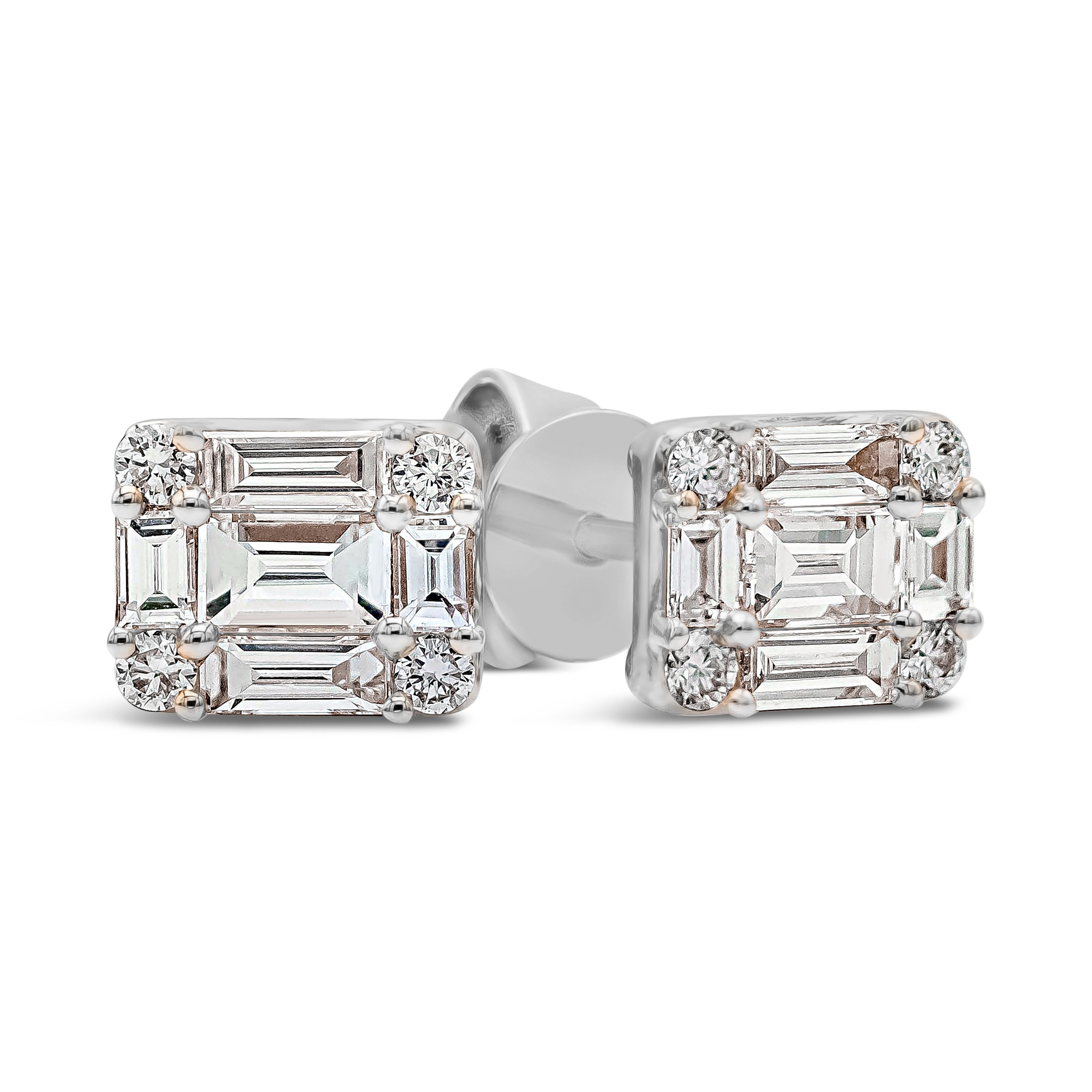 A stylish pair of stud earrings showcasing a cluster of baguette and round diamonds set in an illusion style to make it look like one large diamond. Baguette diamonds weigh 0.47 carats total; round diamonds weigh 0.10 carats total. Made in 18k white