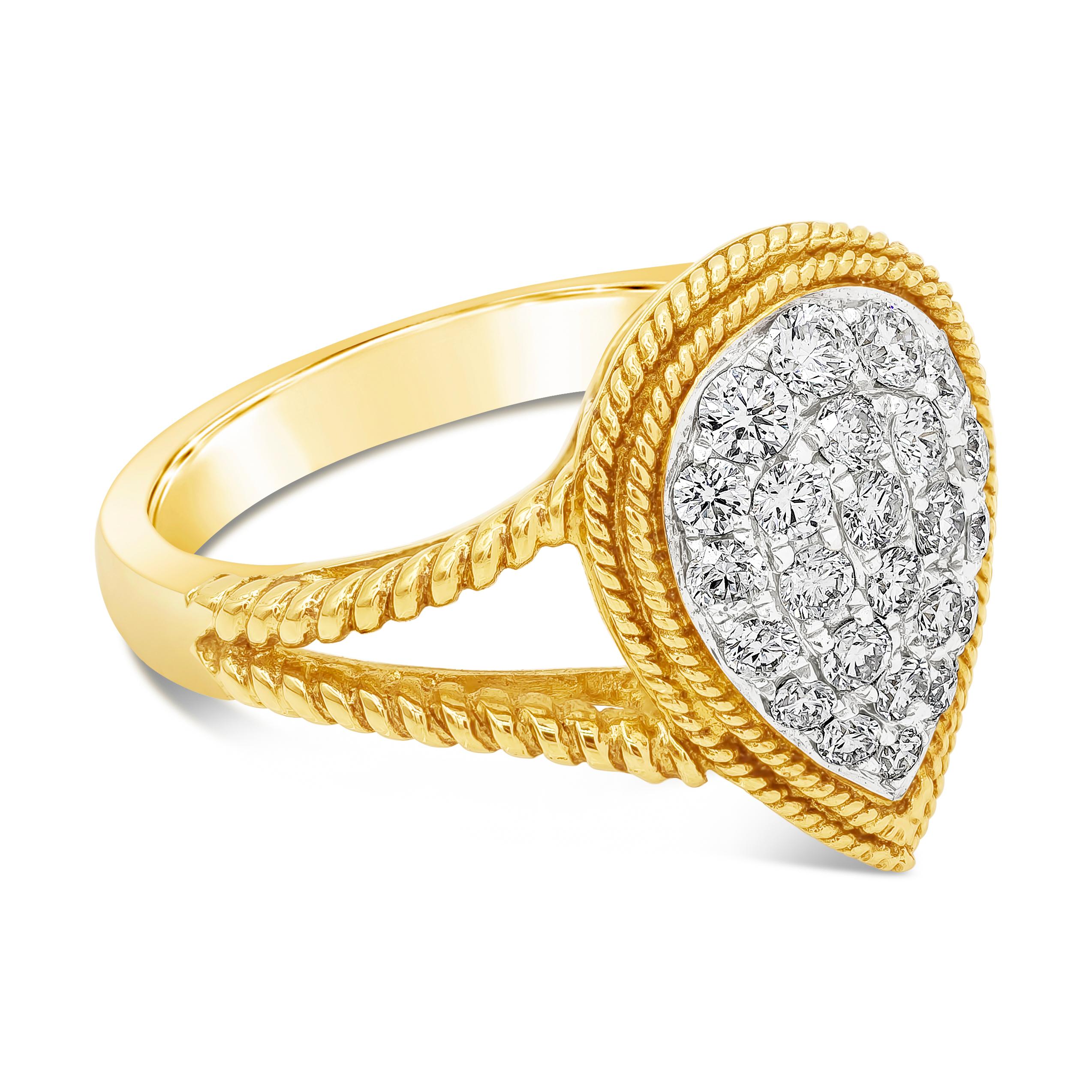 A timeless antique look fashion ring showcasing a cluster of round brilliant diamonds weighing 0.59 carats micro-pave set in pear shape bezel with rope edges design. Set in a split shank, Finished with rope design, made in 18K Yellow Gold, Size 6.25