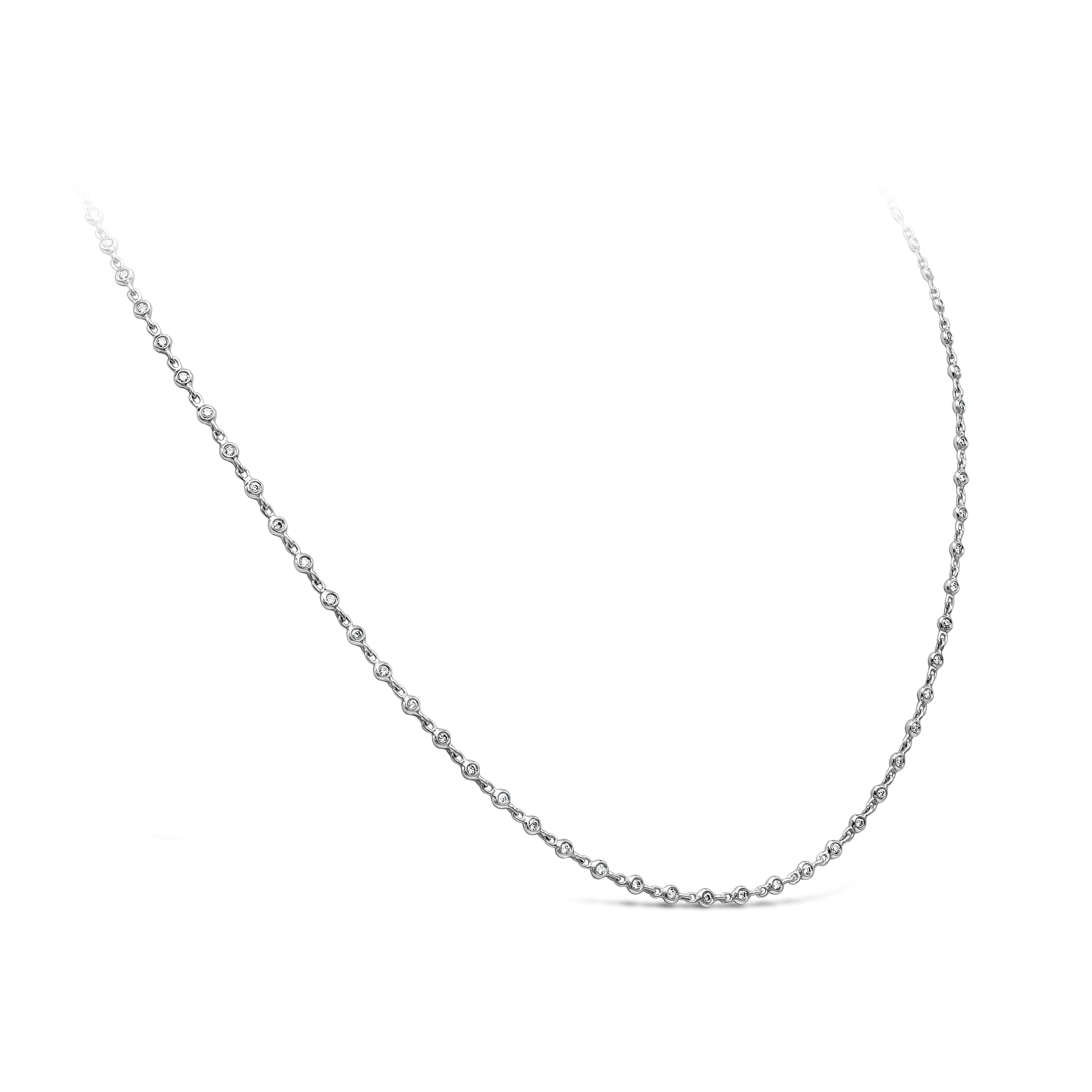 A traditional diamonds by the yard necklace showcasing necklace is bezel set with round diamonds and little space in between each diamond for maximum brilliance. Diamonds weigh 0.62 carats total. Made in 18k white gold.

Style available in different