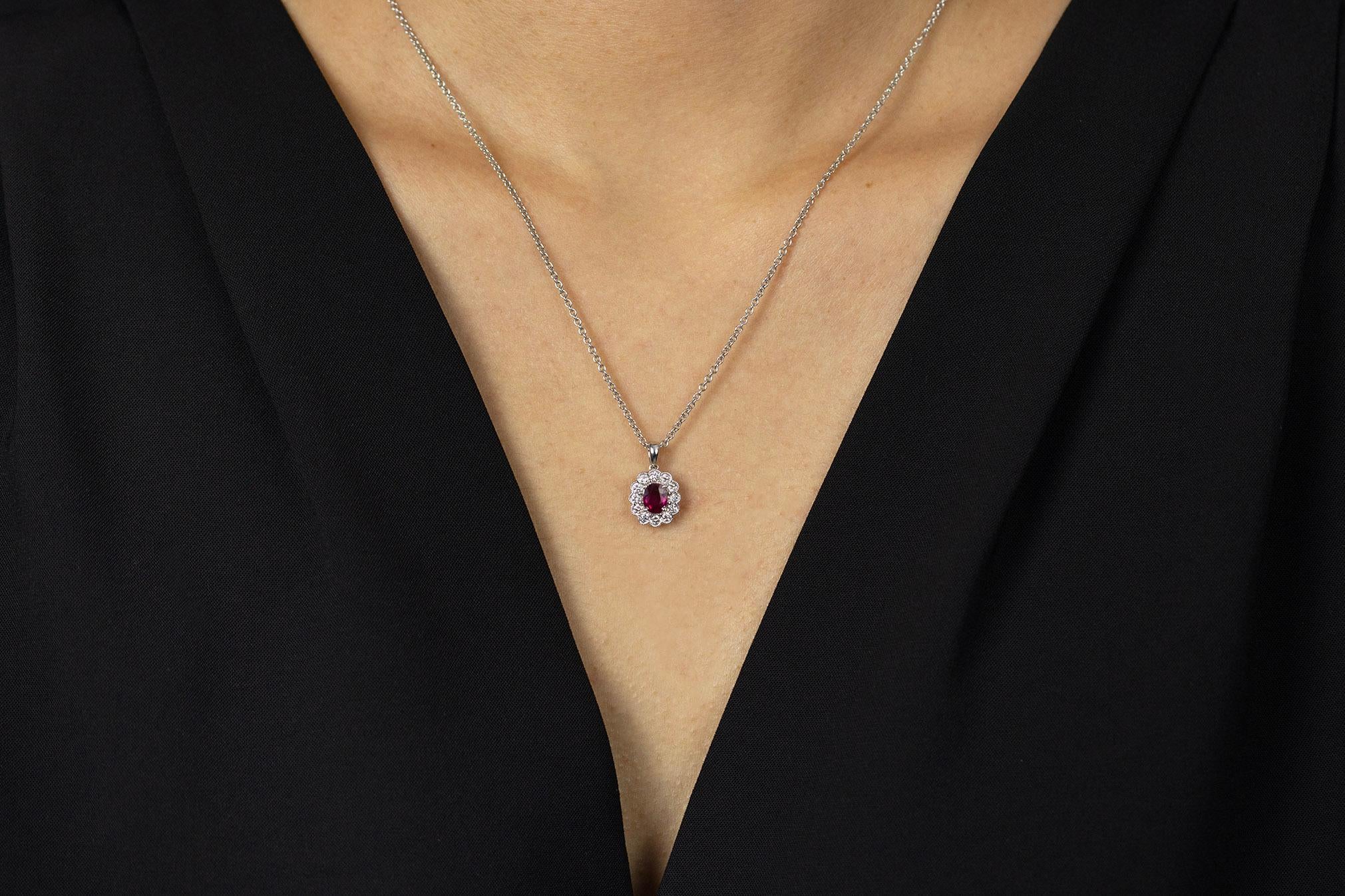 Contemporary Roman Malakov 0.65 Carat Oval Cut Ruby with Diamond Halo Pendant Necklace For Sale