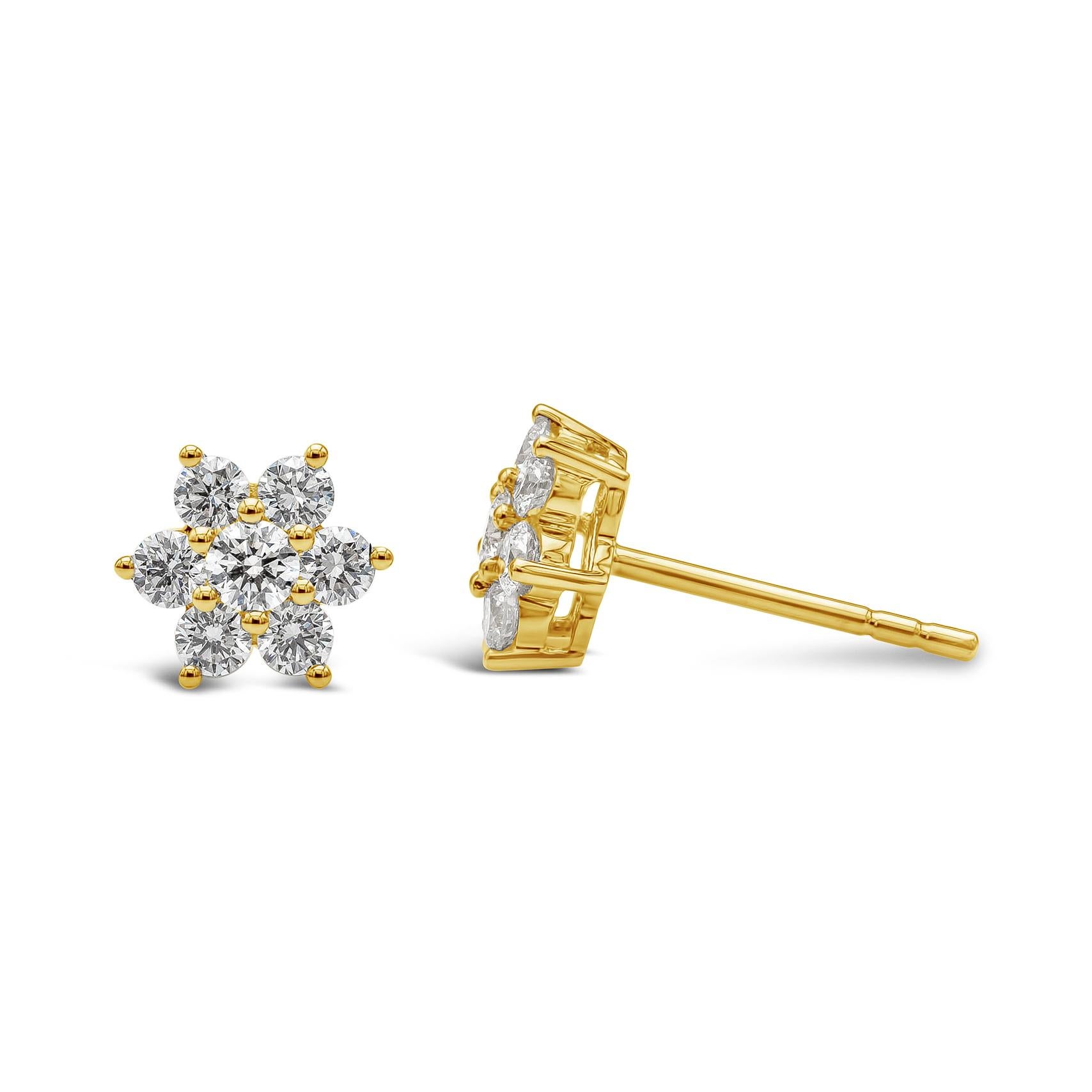 A simple and stylish pair of stud earrings featuring round brilliant diamonds, set in a floral motif made in 18k yellow gold. Diamonds weigh 0.66 carats total. A perfect everyday piece to wear. 

Style available in different price ranges. Prices are