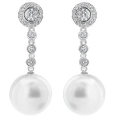 Roman Malakov Boucles d
oreilles en goutte avec diamants ronds brillants de 0,69 carat et perles blanches