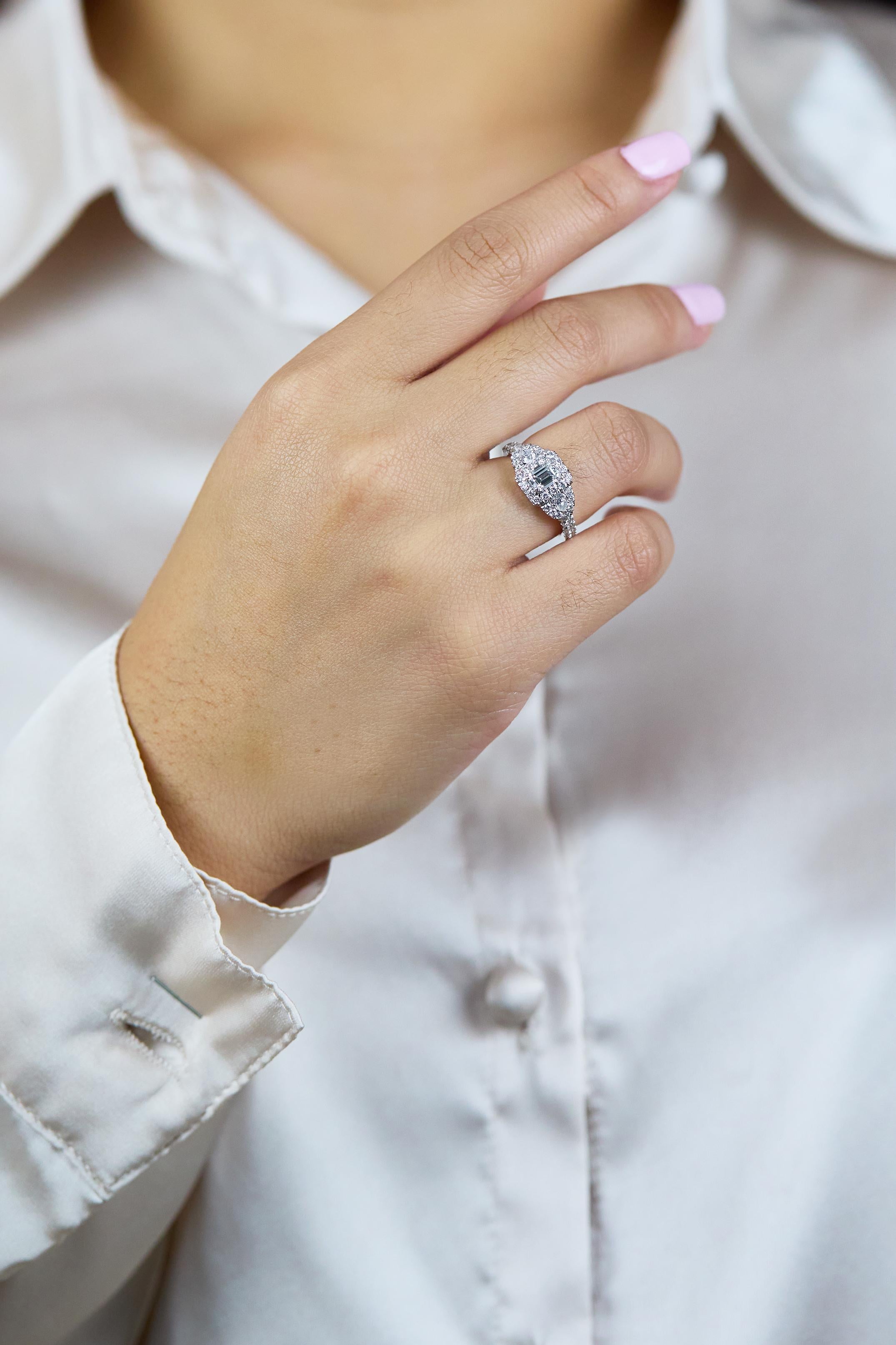 emerald cut trilogy ring