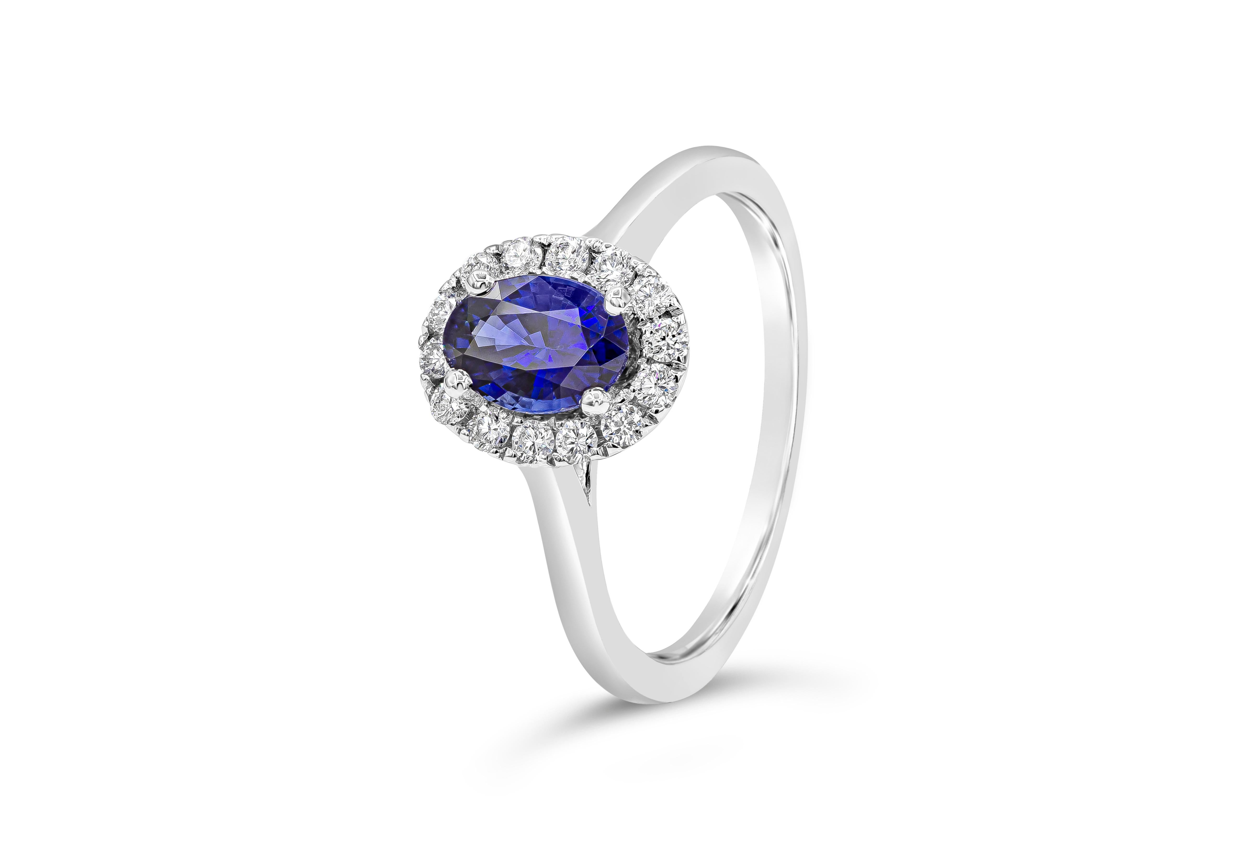 Contemporary Roman Malakov 0.76 Carat Blue Sapphire and Diamond Halo Engagement Ring