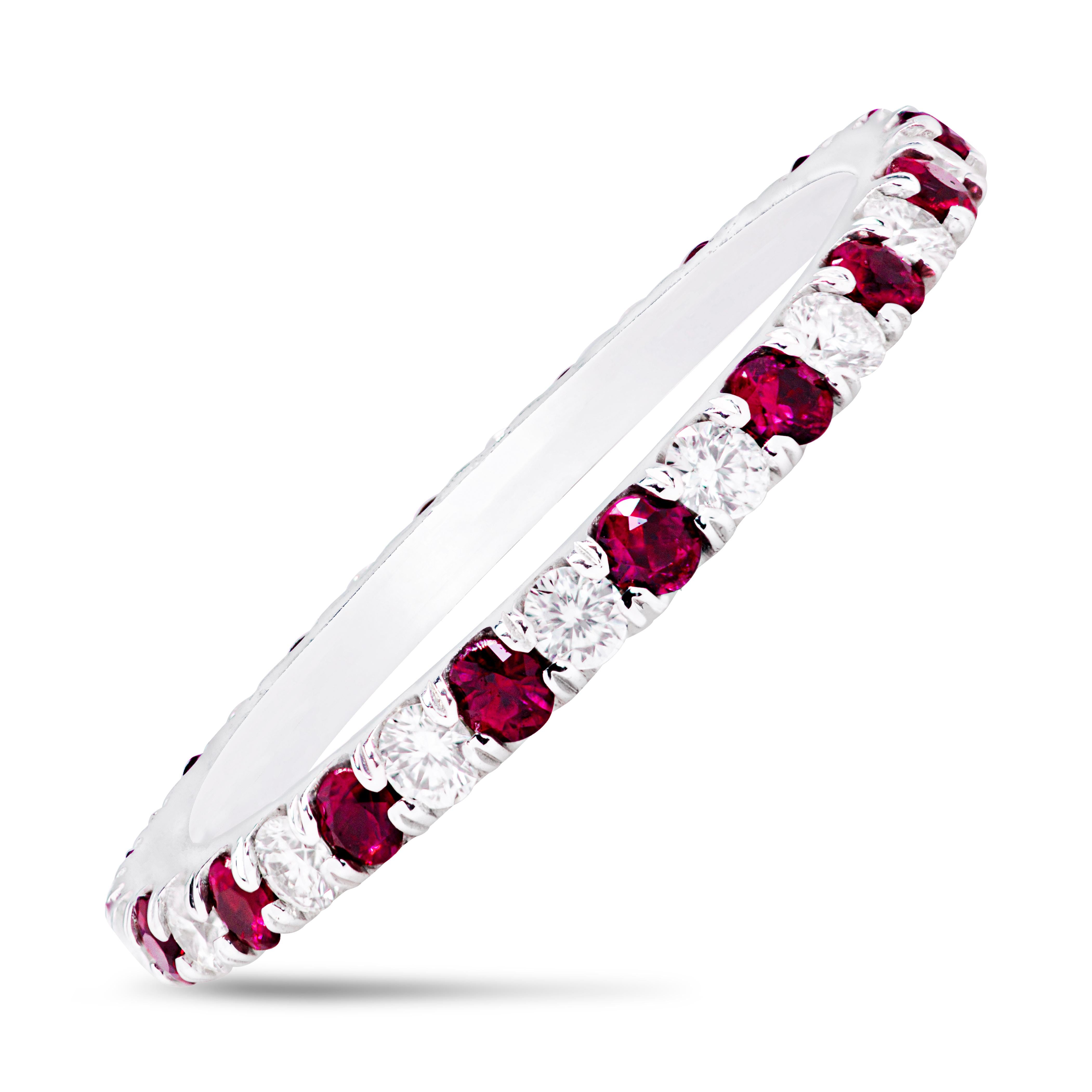 This wedding band features 18 natural rubies of 0.44 carats, alternating with 18 round brilliant diamonds of 0.34 carats. The stones weigh 0.78 carats total. Set in 18K white gold. Size 6.5 US. 

Roman Malakov is a custom house, specializing in
