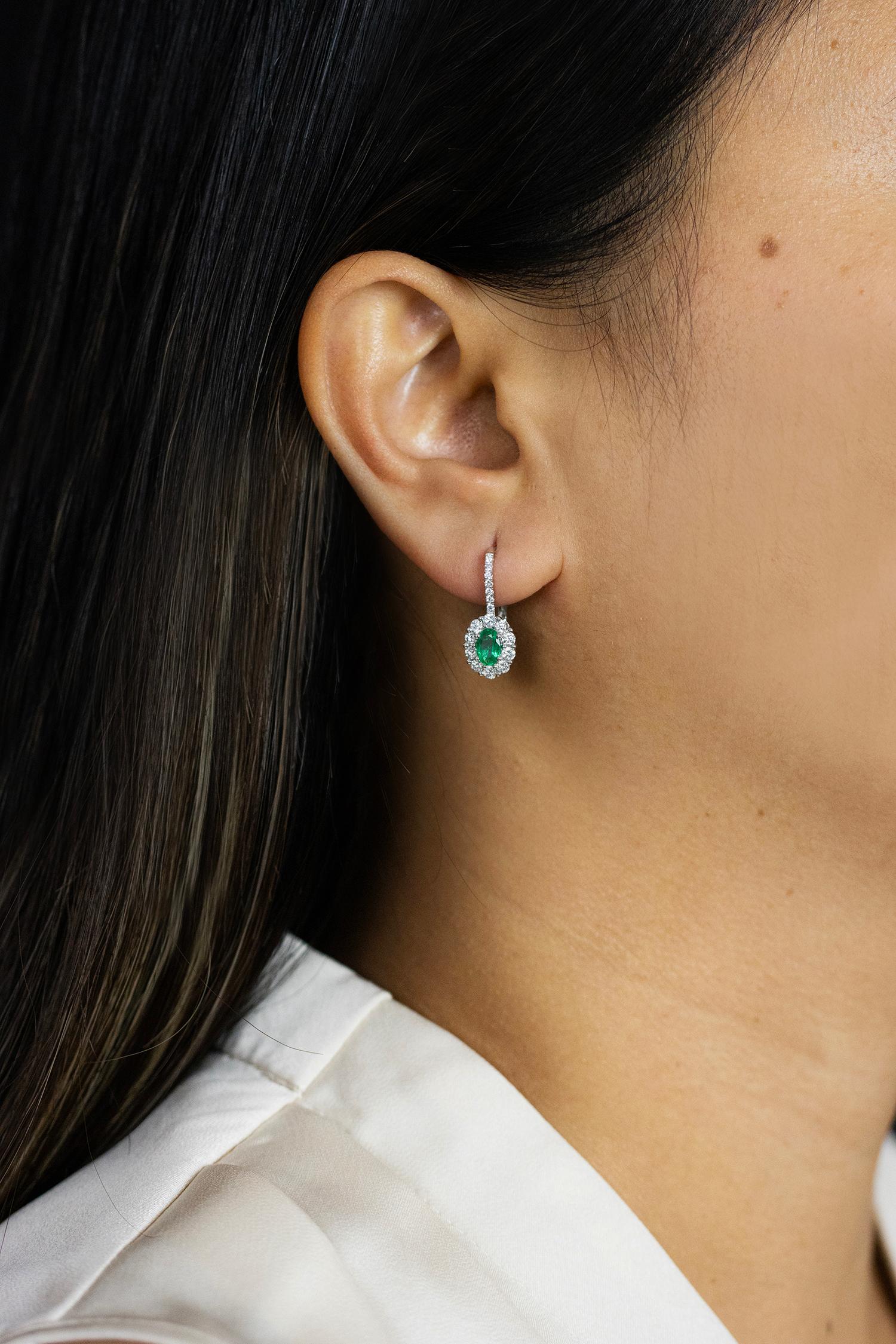 Women's Roman Malakov 0.78 Carat Oval Cut Emerald and Diamond Halo Lever-Back Earrings For Sale