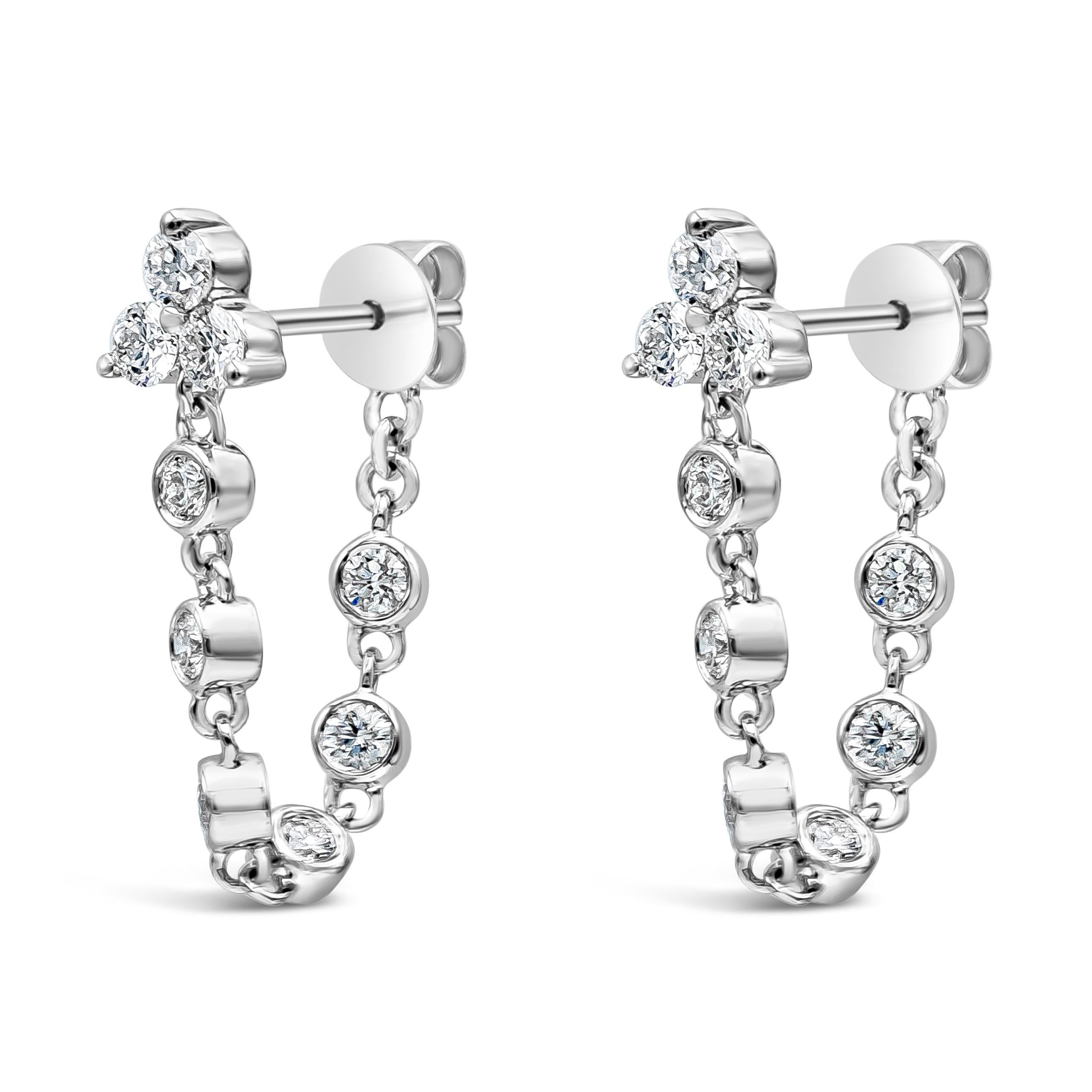 This unique and chic earring showcases a round brilliant diamonds set as a dangle hoop earring, Diamonds weigh 0.80 carats total, F Color and SI in Clarity. Made with 18K White Gold

Style available in different price ranges. Prices are based on
