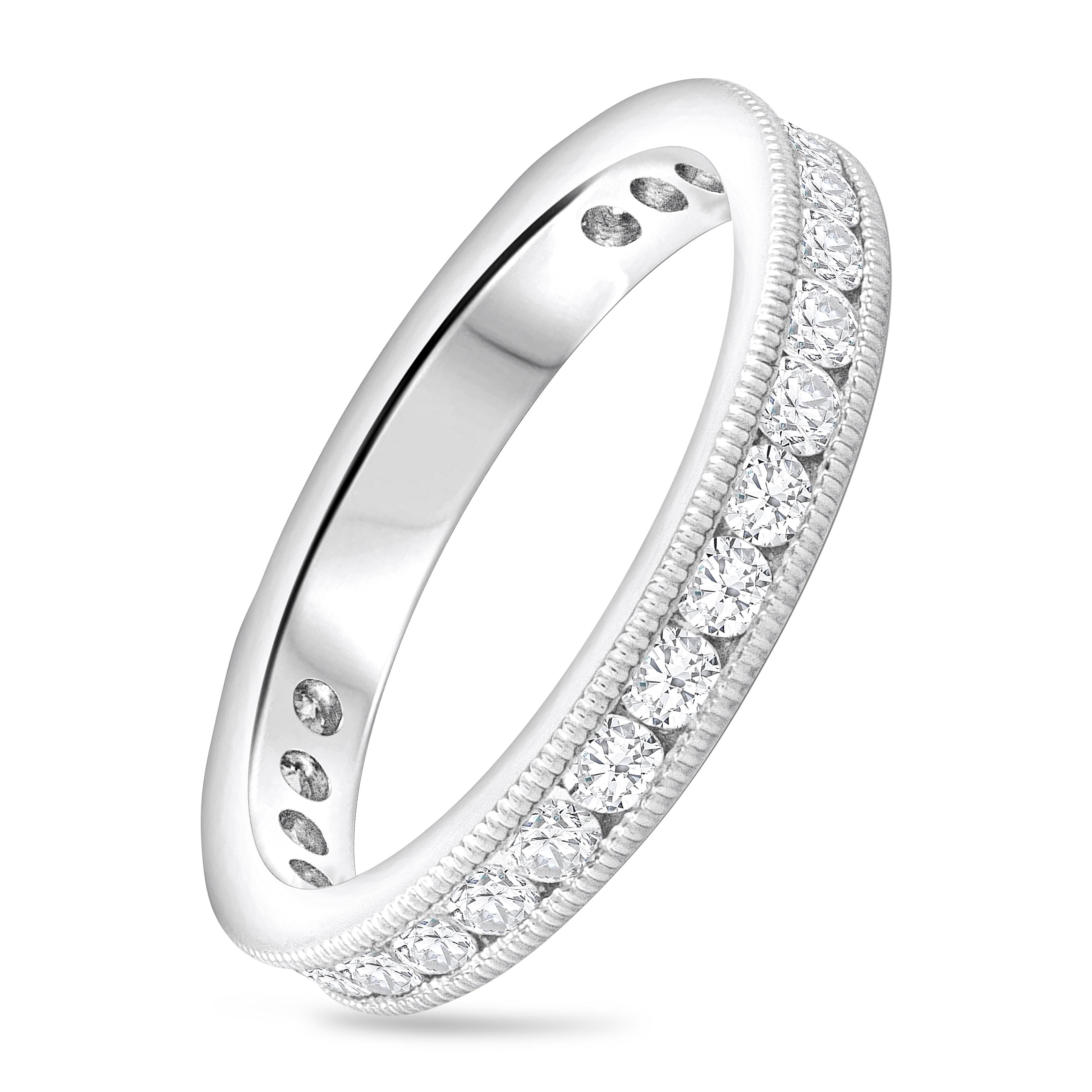 An expertly-crafted wedding band showcasing brilliant round diamonds weighing 0.81 carats total, set in a channel set and finished with intricate milgrain edges. Made with Platinum. Size 6.5 US resizable upon request.

Roman Malakov is a custom