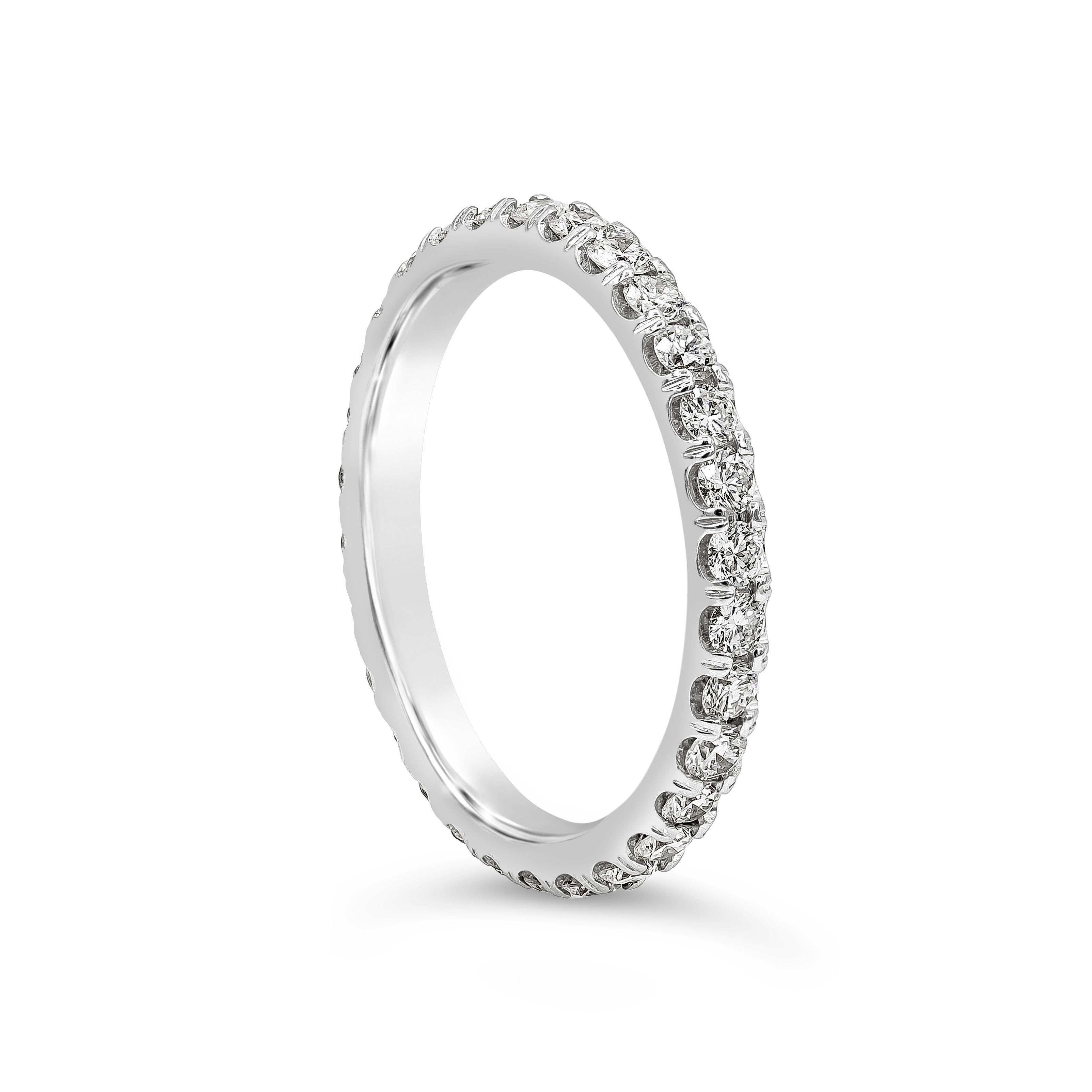 A classic eternity wedding band style showcasing a row of brilliant round diamonds weighing 0.90 carats total, Scalloped pave-set, Made with 18K White Gold Size 6 US

Style available in different price ranges. Prices are based on your selection.