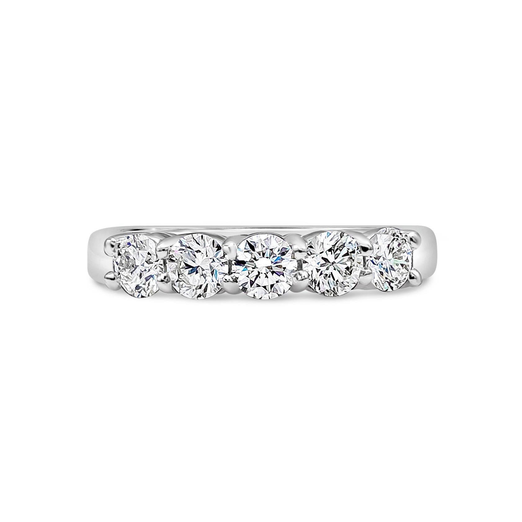 A fashionable and chic style ring showcasing 5 brilliant round diamond weighing 1.00 carat total, I Color and VS in Clarity.  Set in a shared four-prong setting. Made 14K White Gold,  Size 6.25 US

Style available in different price ranges. Prices