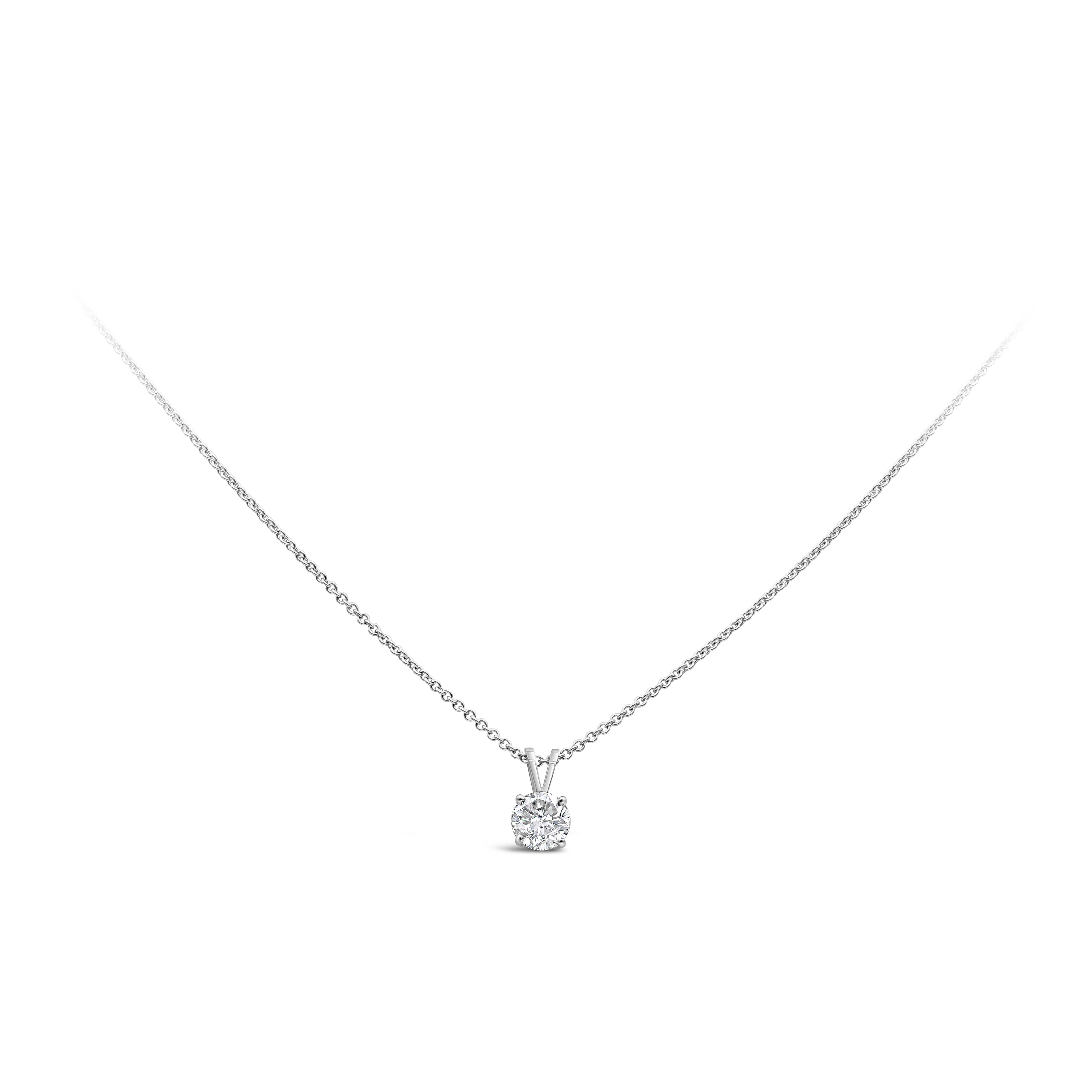 This simple and timeless pendant necklace showcases one brilliant round cut diamond weighing 1.00 carats, F color and SI3/I1 clarity. Mounted in a beautiful four prong setting. Made in 14 karat and 18 karat white gold. 

Roman Malakov is a custom