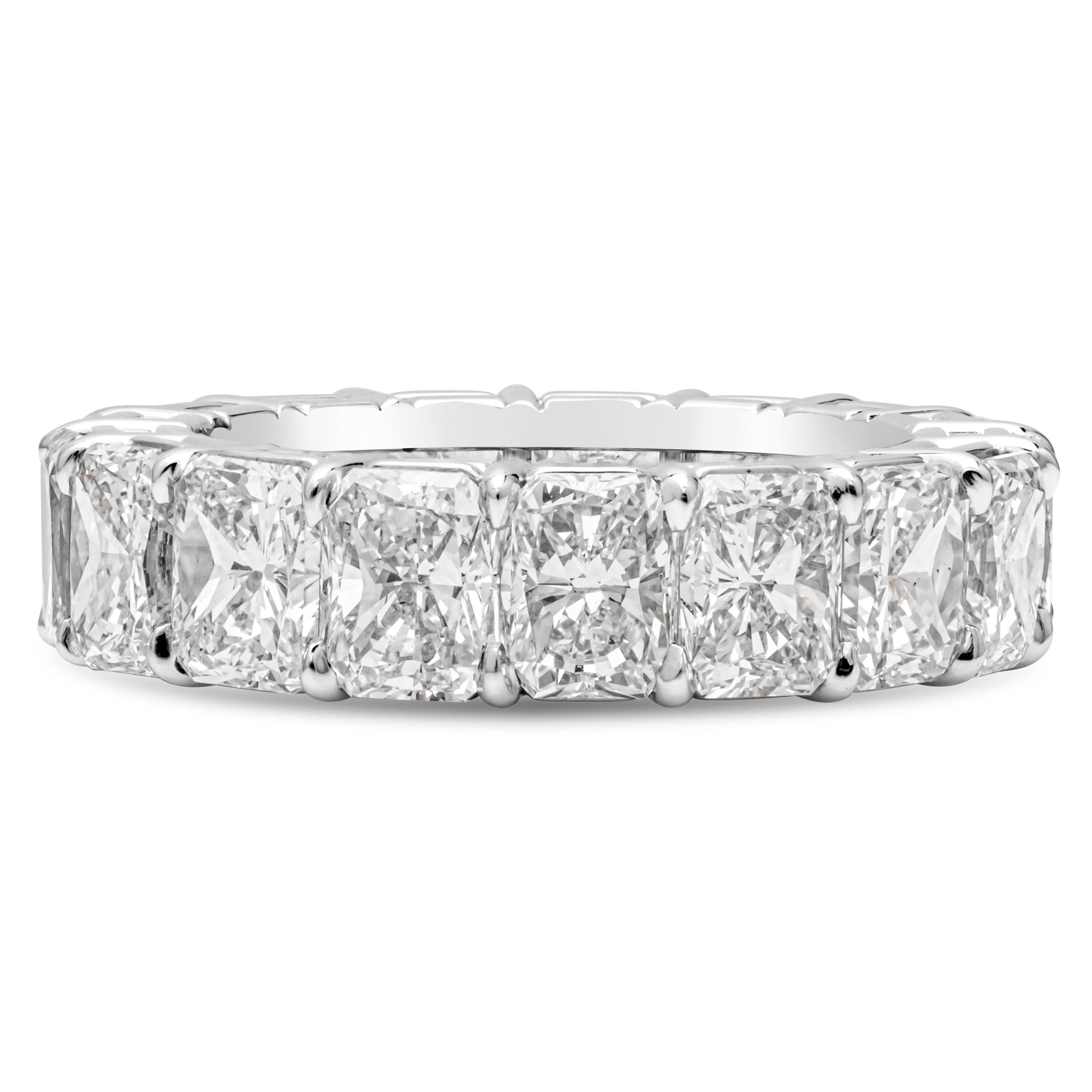 A brilliant and important eternity wedding band showcasing a row of radiant cut diamonds weighing 10.50 carats total, G-H Color and SI in clarity. Made with Platinum. Size 6.75 US.

Roman Malakov is a custom house, specializing in creating anything