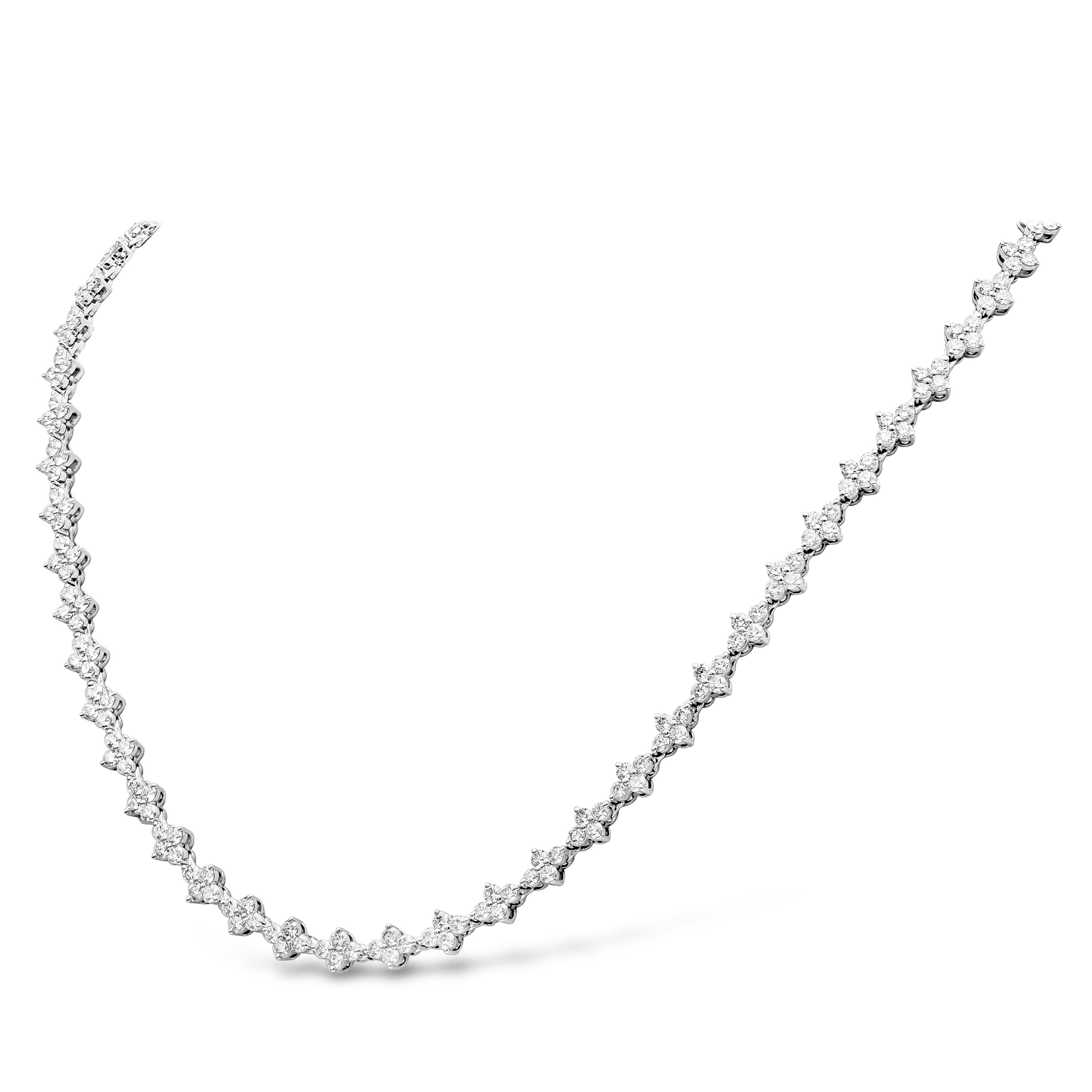 A magnificent diamond necklace showcasing round brilliant diamonds clustered in groups of 4. Necklace has 240 stone weighing 10.99 carats, F Color and VS/SI in Clarity. 18 inches long and made in 18k White Gold.

Roman Malakov is a custom house,