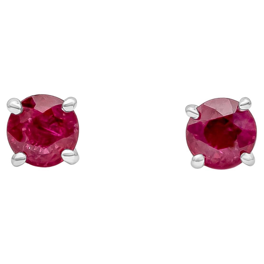 A classic pair of stud earrings showcasing vibrant red round cut rubies weighing 1.12 carats total. Mounted in a timeless four-prong design setting, Made with 18K White Gold.

Style available in different price ranges. Prices are based on your