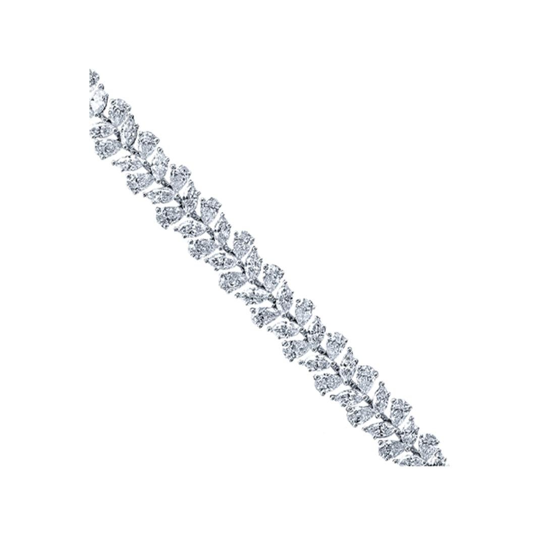 Ein elegantes Armband mit marquise- und birnenförmigen Diamanten mit einem Gesamtgewicht von 11,25 Karat, die abwechselnd schön gefasst sind. Die Diamanten sind in 18 Karat Weißgold gefasst, die Länge beträgt 7 Zoll. Ein luxuriöses