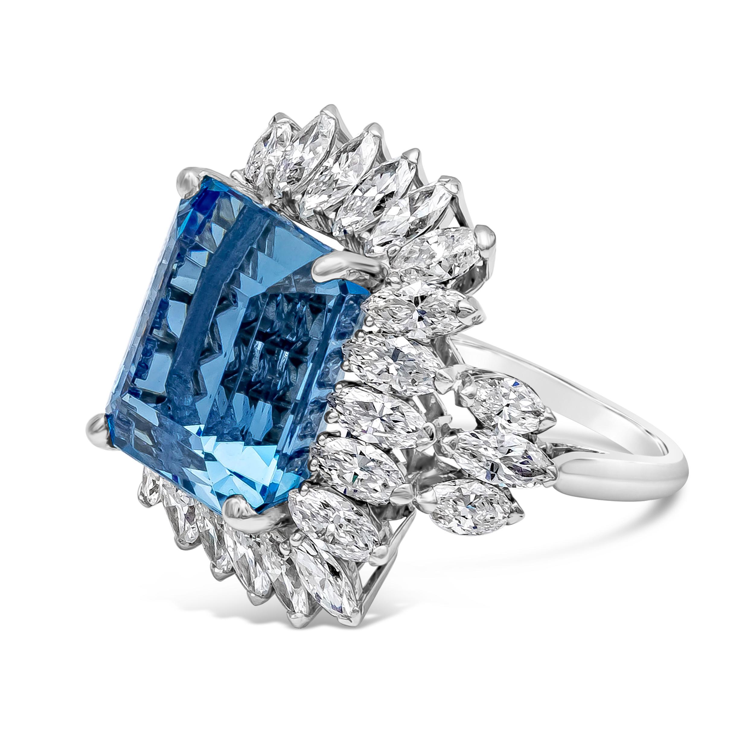 Showcasing an emerald cut 11.48 carat blue aquamarine in 4 prong setting. Surrounded by 28 sparkling marquise cut diamond. Total weight of the diamonds is 4.36 carats. Made with Platinum. Size 6 US (Sizable upon request).

Roman Malakov is a custom