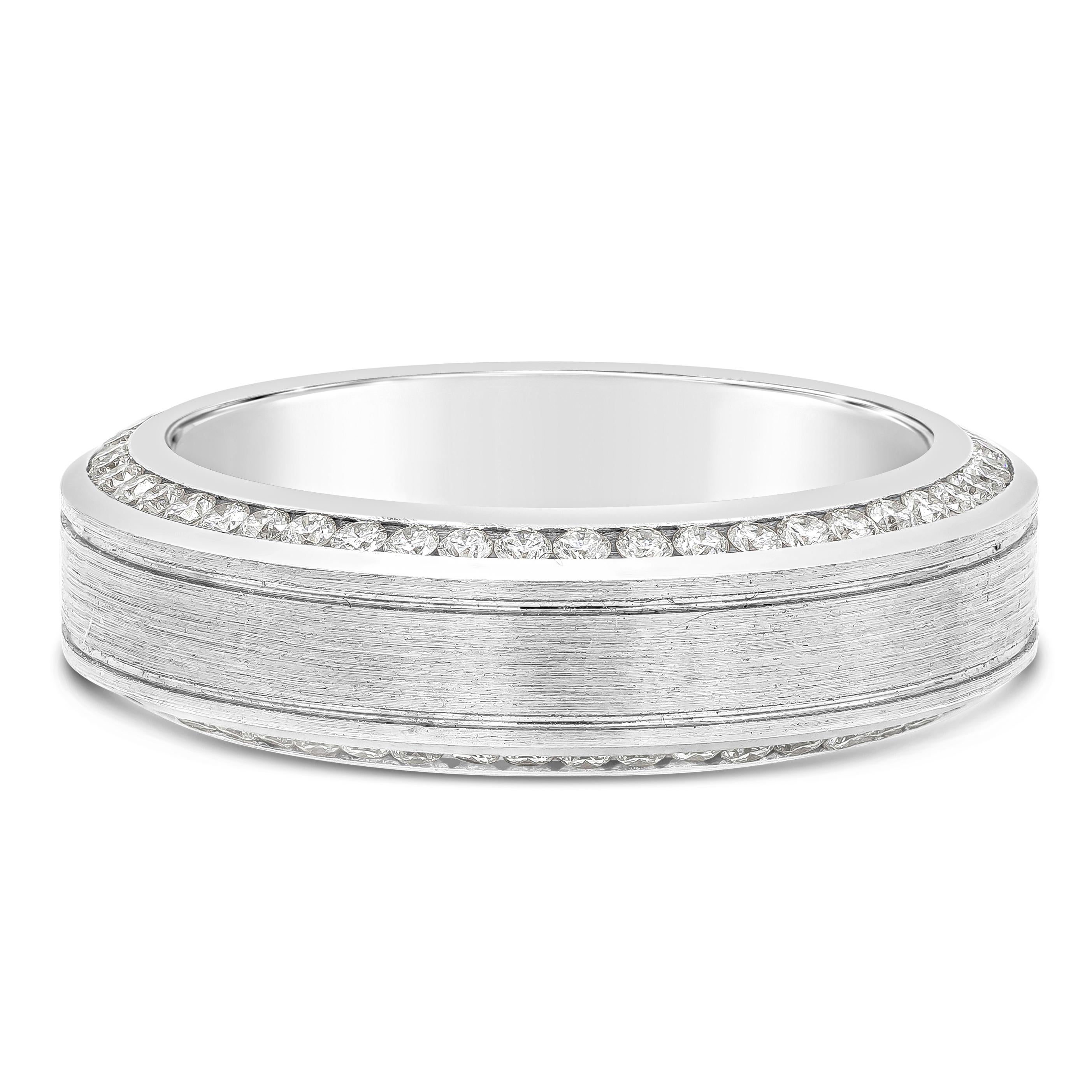 A comfort fit wedding band wrapped with brilliant round diamond channel set on each side of the ring. Two lines finely-engraved in the middle portion of the ring. 7mm wide, size 10 US.

Roman Malakov is a custom house, specializing in creating