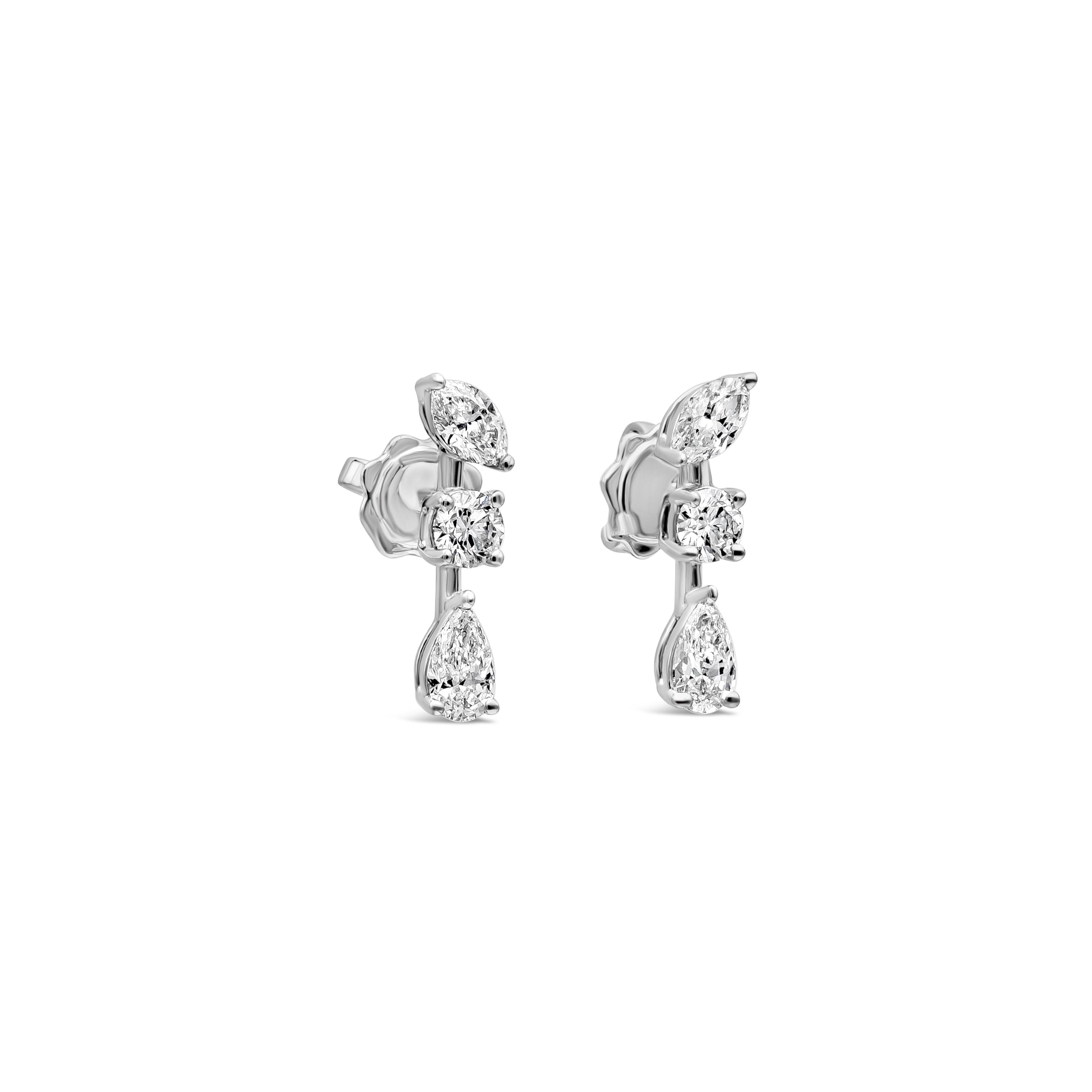 Une paire simple mais élégante de mini-boucles d'oreilles mettant en valeur des diamants de taille marquise, poire et brillant pesant 1,22 carats au total, de couleur FG et de pureté SI. Fabriqué en or blanc 18 carats.

Roman Malakov est une maison