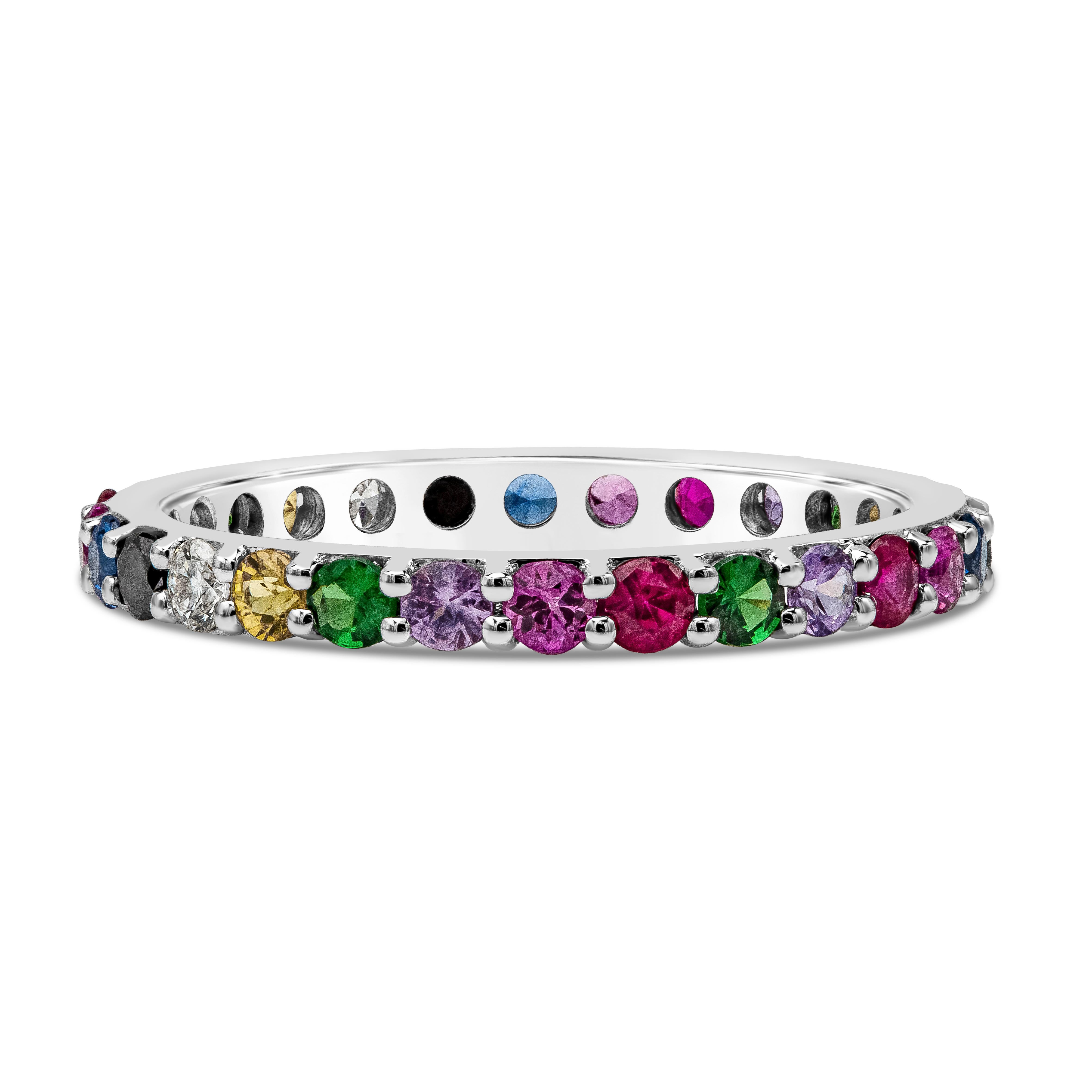 A fashionable eternity wedding band, showcasing a unique ring with different color gemstones and diamonds weighing 1.23 carats total. Set in a scalloped-pave style of 18K white gold. Size 6.5 US, resizable upon request.

Roman Malakov is a custom