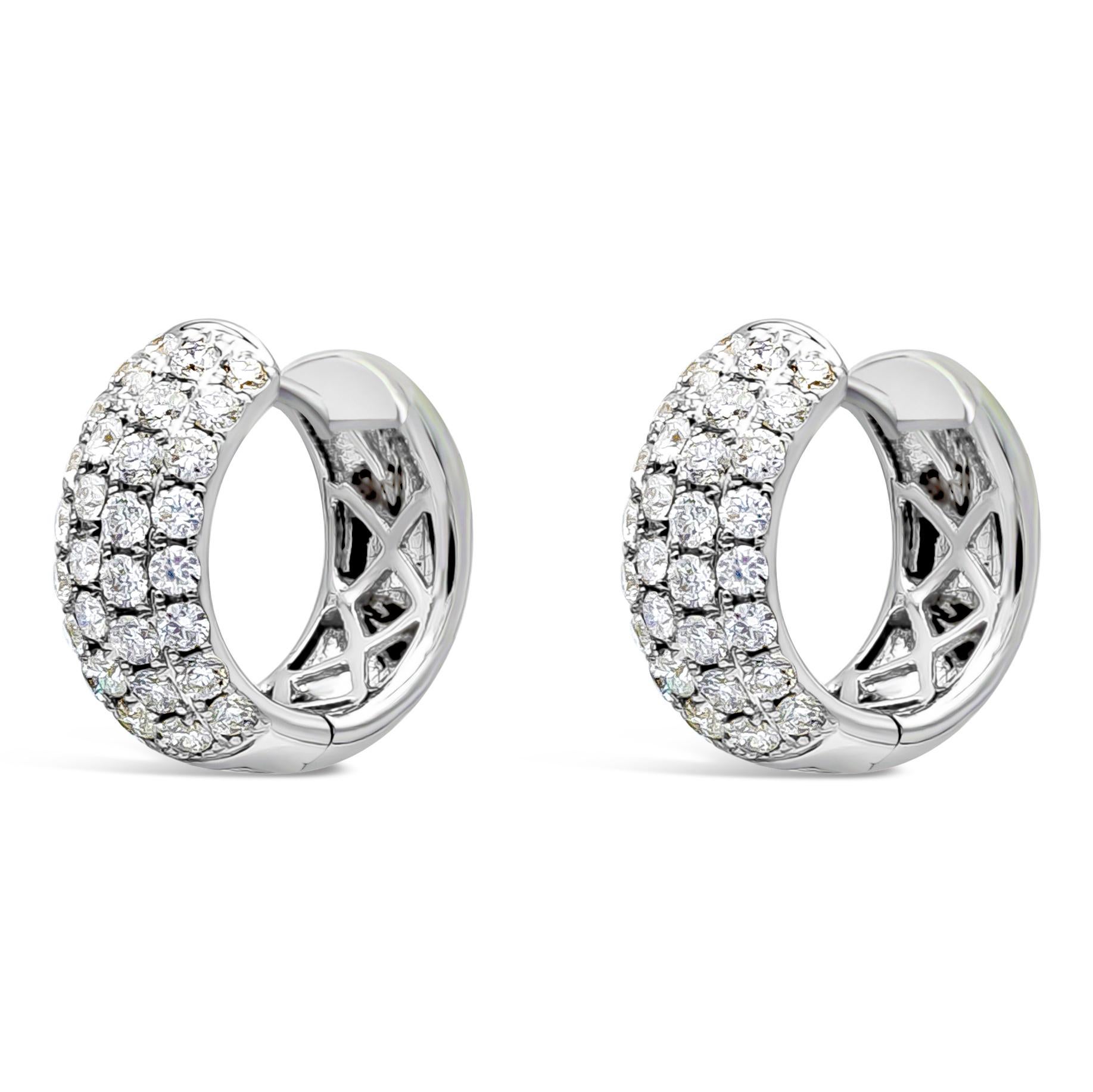A simple chic rounded huggie hoop earrings showcasing 64 pieces round diamond weighing 1.23 carat total, F Color and VS in Clarity. Pave style setting. Made with 18K White Gold. 

Roman Malakov is a custom house, specializing in creating anything